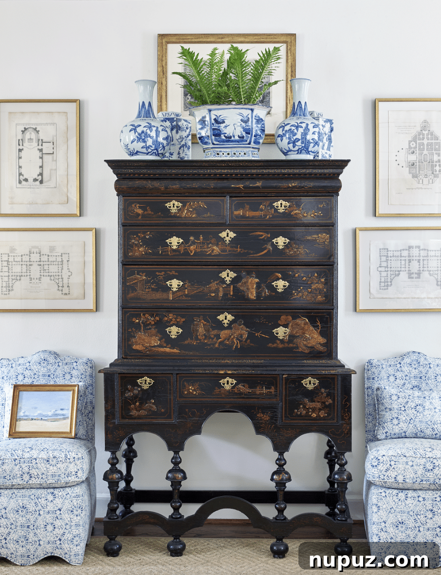 Sarah Bartholomew designed elegant living room with classic Southern charm, featuring comfortable seating, curated decor, and natural light, embodying timeless home design principles.