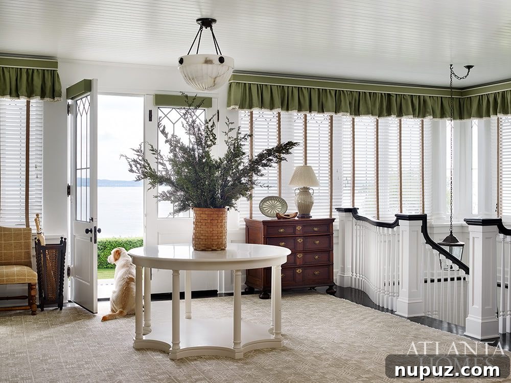 Elegance Meets the Water's Edge: A Jackye Lanham Home 10 A beautiful architectural detail featuring an elegant staircase with a decorative banister and intricate wood carvings, adding character to the home.
