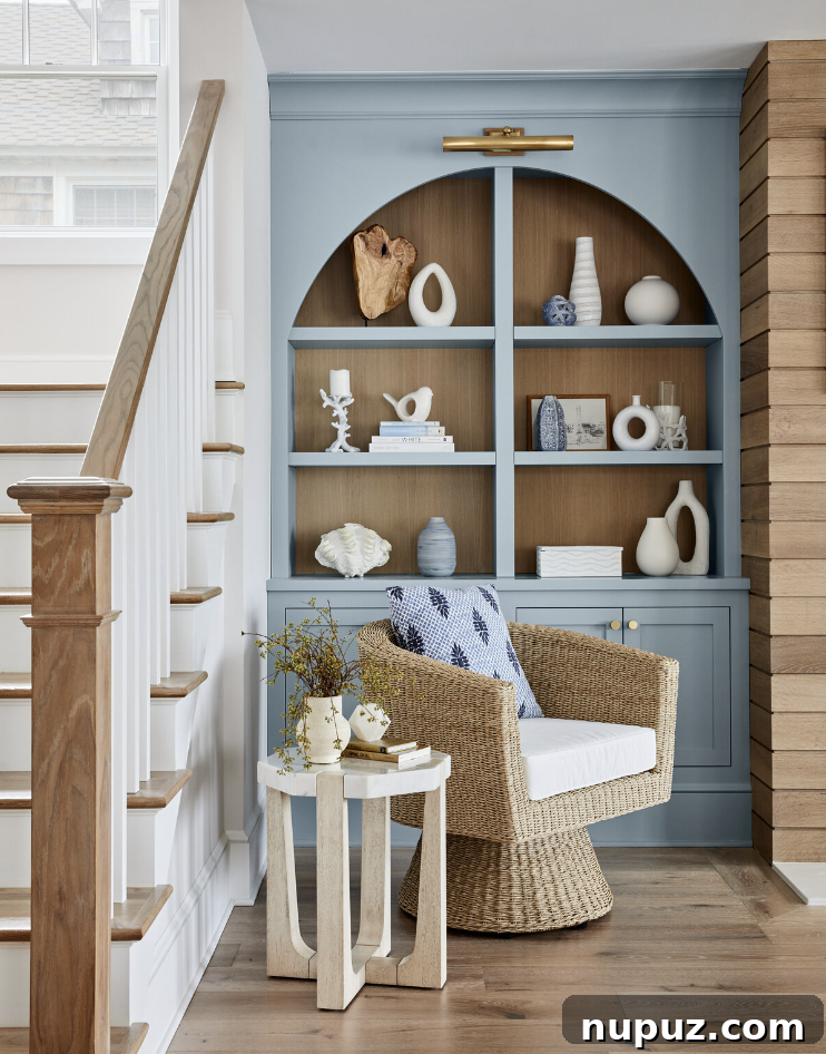 Stylish Family Homes: Interiors for Inspired Living 2 Elegant and welcoming entryway by Cory Connor Designs, featuring sophisticated furnishings and a serene color palette, expertly captured by Laura Moss Photography.