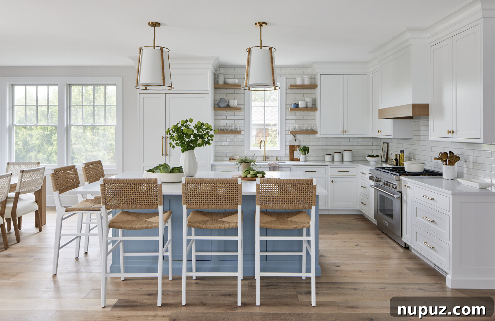Stylish Family Homes: Interiors for Inspired Living 8 Bright and airy family room corner with comfortable seating and elegant lighting, perfect for relaxed gatherings.
