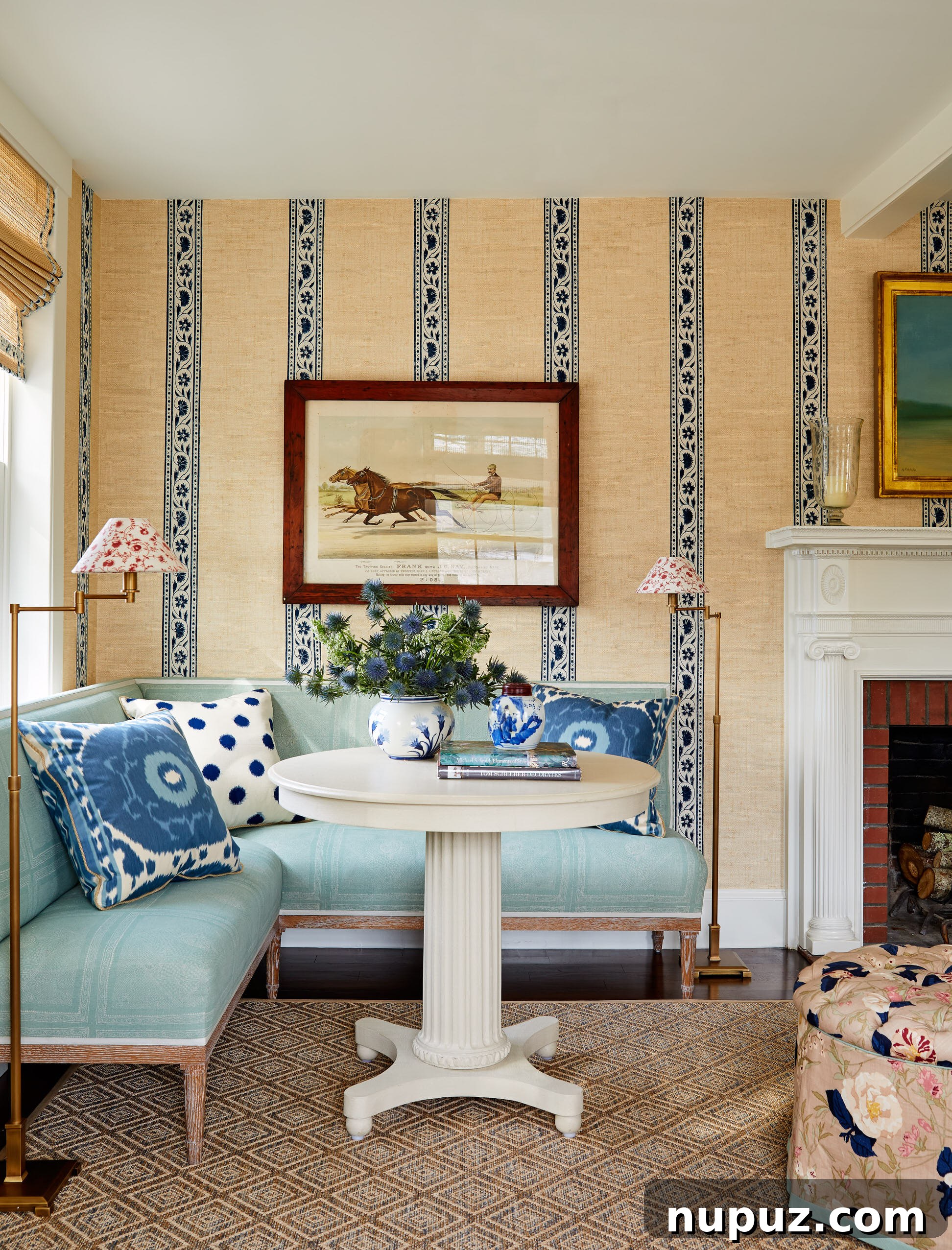 Living room with banquette and beautiful wallpaper, showcasing thoughtful design for adding character. Photos by Read McKendree, Styled by Alexandra Morris, Construction & Contracting by RB Wood Contracting.
