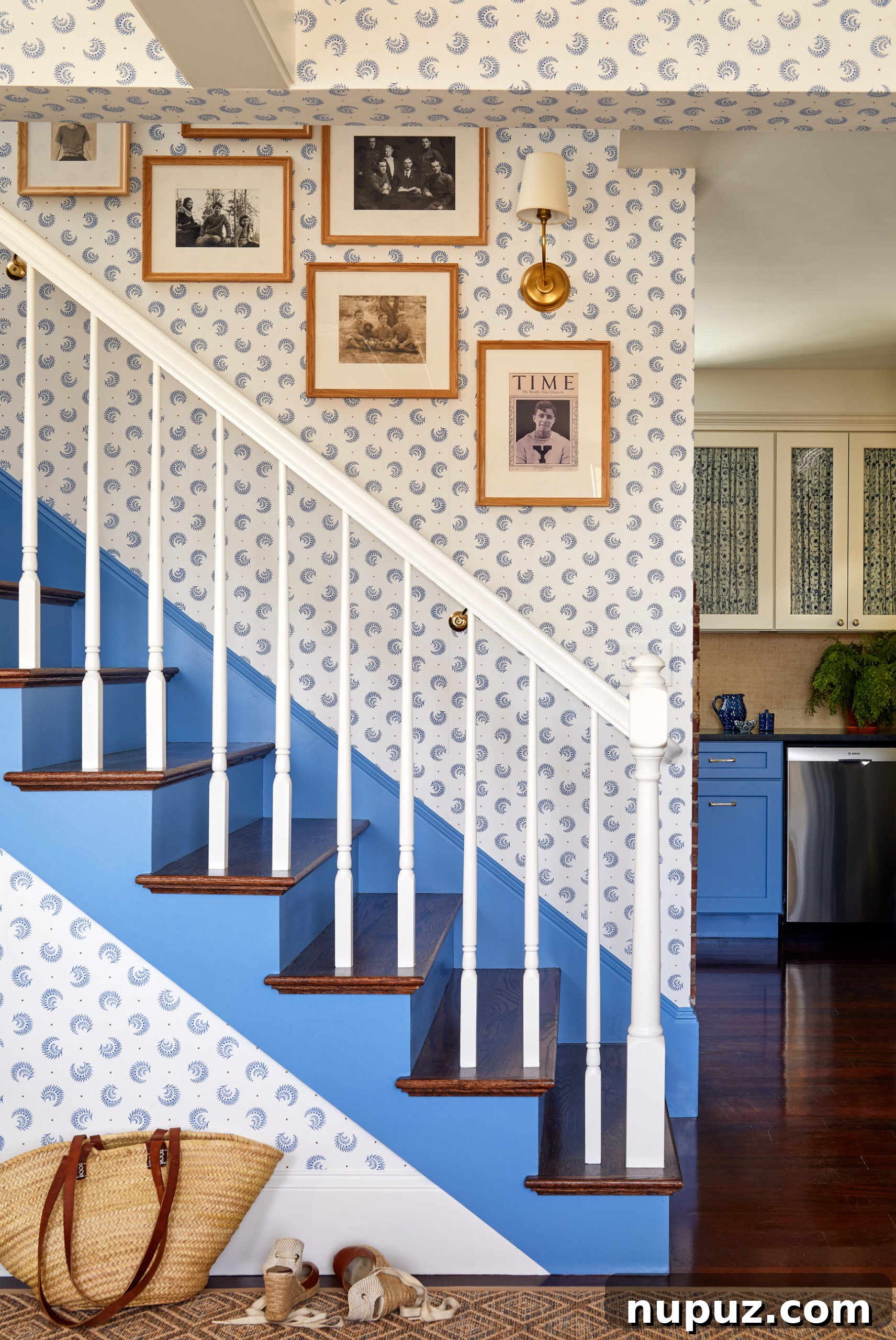 Blue and white staircase as an architectural detail. This unique feature adds significant character to the home. Photos by Read McKendree, Styled by Alexandra Morris, Construction & Contracting by RB Wood Contracting.