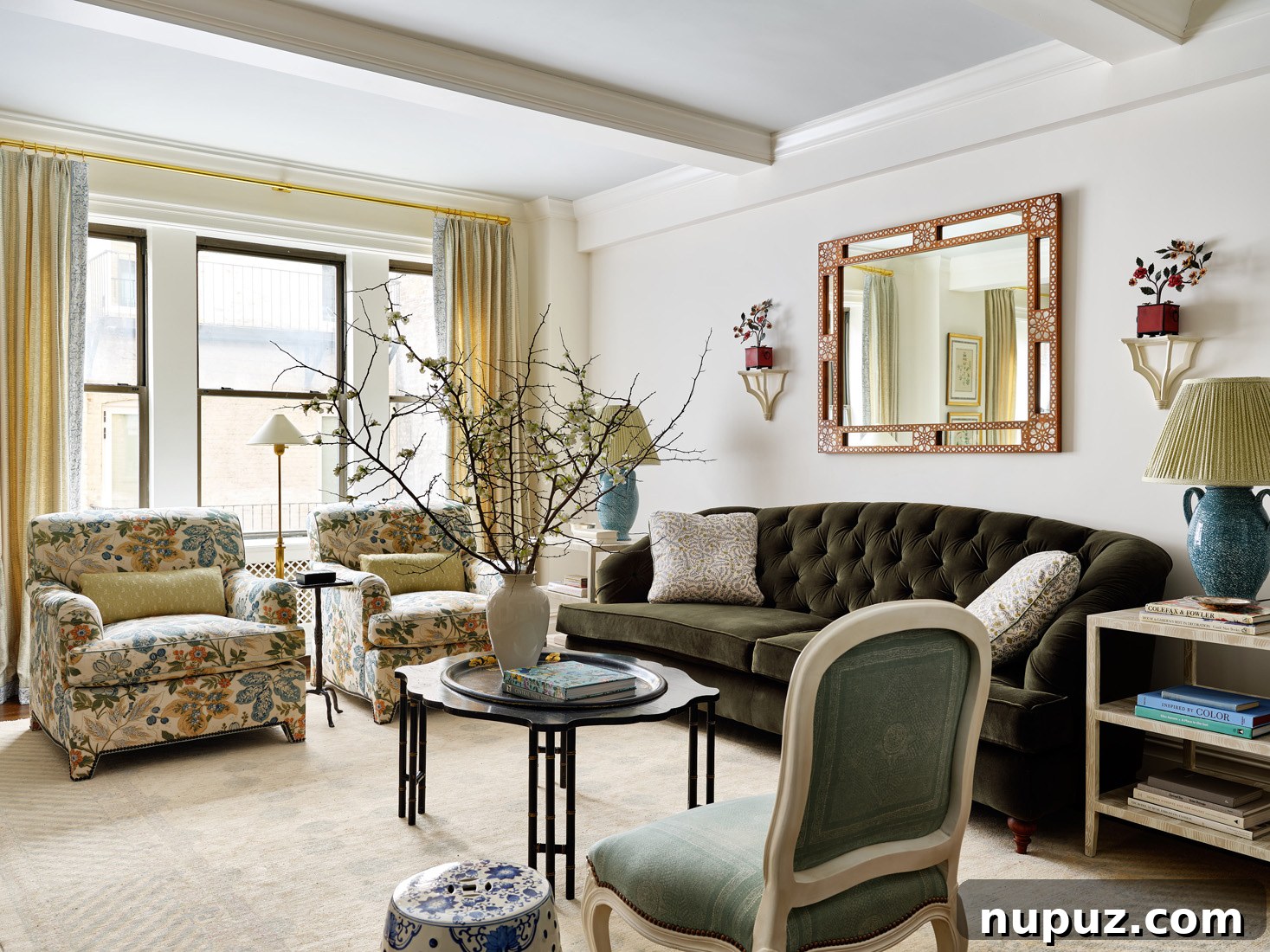 Elegant living room showcasing fabulous architectural details, including intricate moldings and a sophisticated fireplace, creating a refined atmosphere.