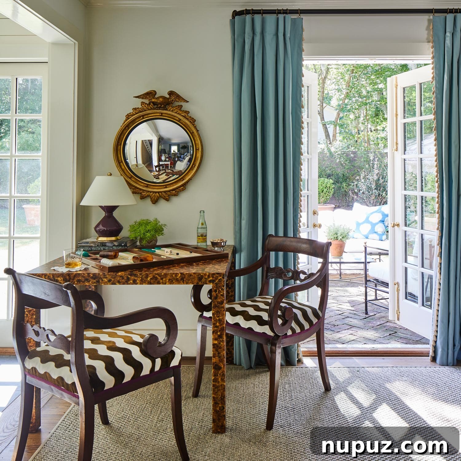 Elly Poston's timeless and elegant spaces seamlessly blend sophistication with livability, perfect for modern luxury home decor.