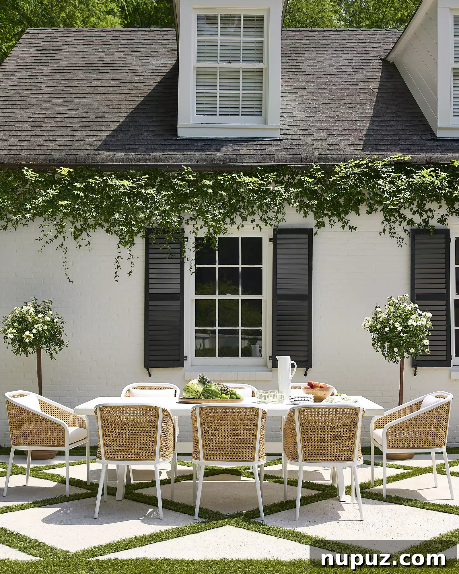 stunning home tours - Serena and lily outdoor dining room - dining table with wicker chairs