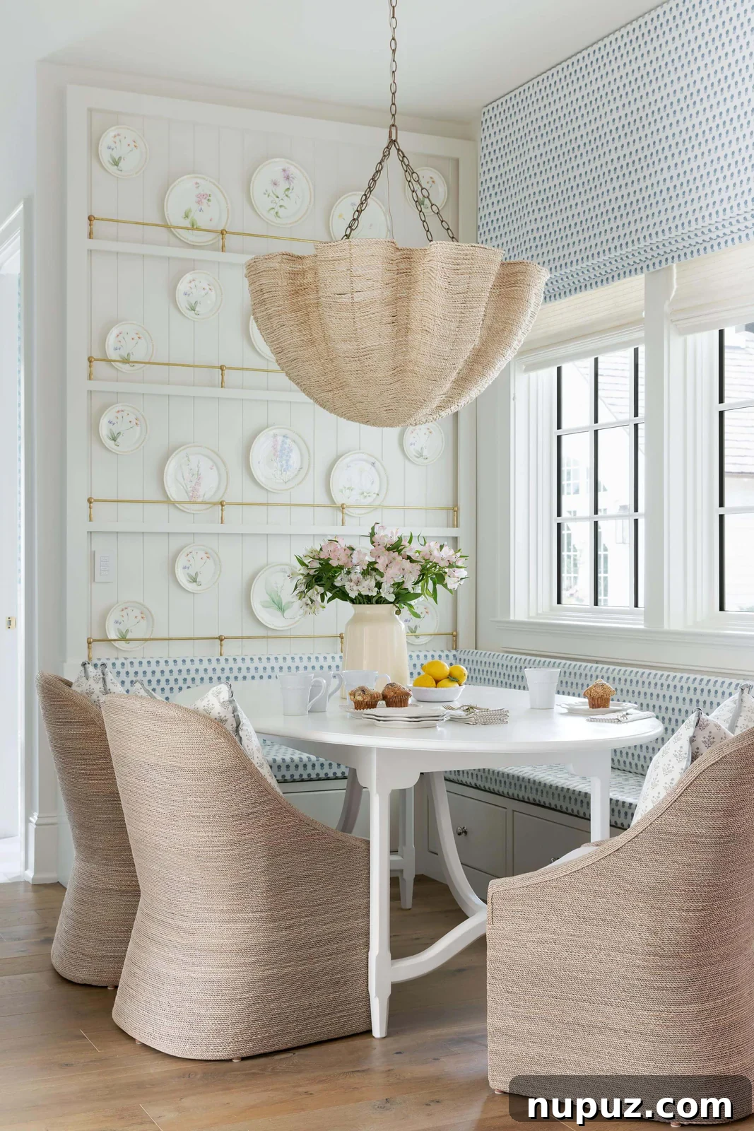 A beautifully designed living room with warm neutrals and natural textures, reflecting Studio McGee's signature style.