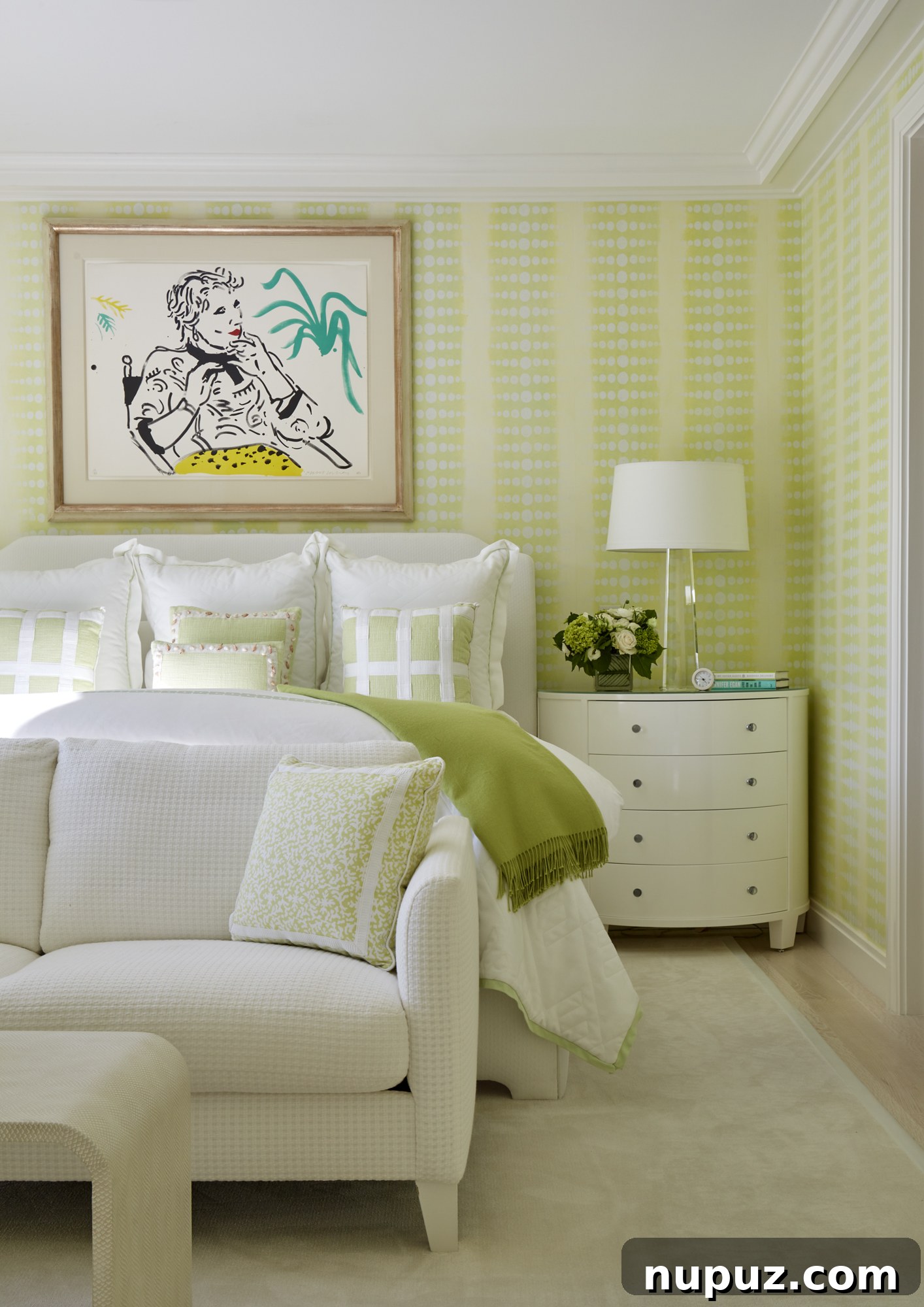 Inside a Palm Beach Home Redefining Modern Elegance 13 Inviting green and white bedroom adorned with elegant green wallpaper, contemporary art, and sophisticated furnishings, offering a peaceful retreat.
