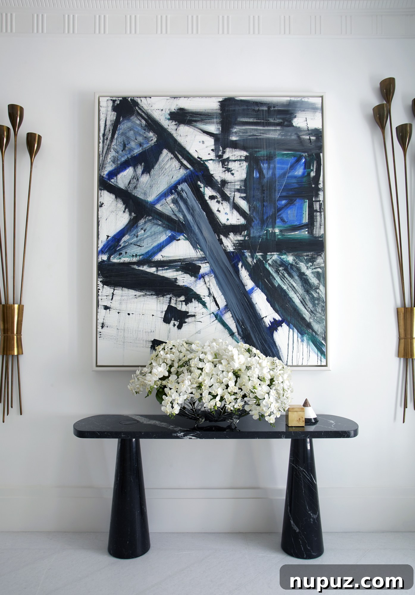 Inside a Palm Beach Home Redefining Modern Elegance 3 A vibrant modern art piece adorning a wall in the luxurious Palm Beach home, showcasing the blend of timeless glamour and contemporary aesthetics.