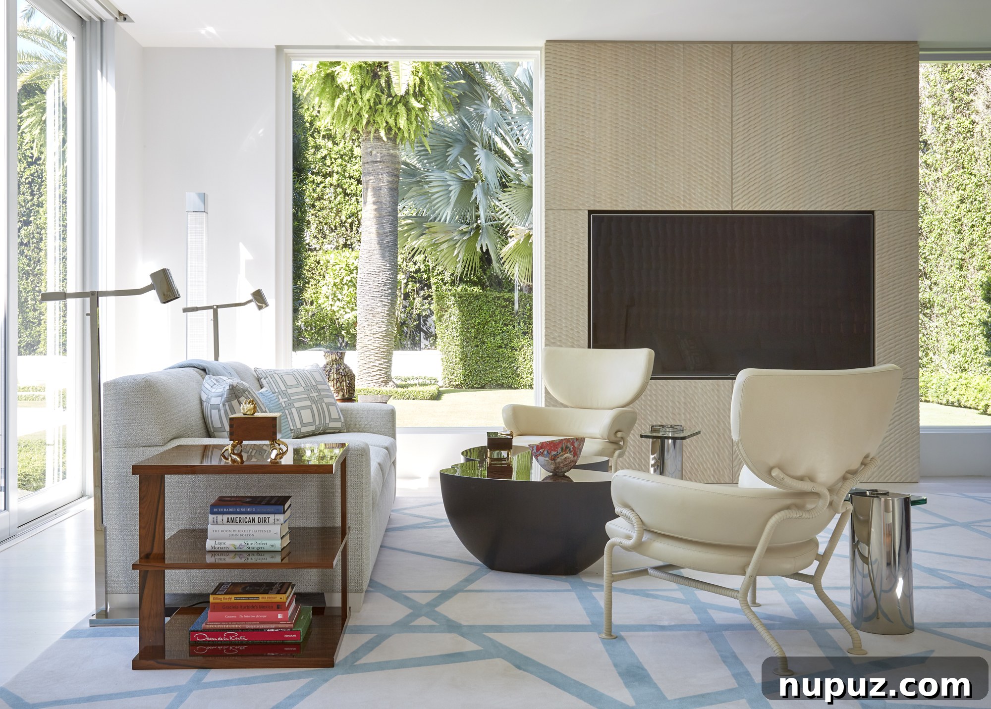 Inside a Palm Beach Home Redefining Modern Elegance 8 View of an expansive hallway or open-plan area connecting various elegant spaces within the Palm Beach luxury residence, featuring architectural moldings and a soft tonal palette.