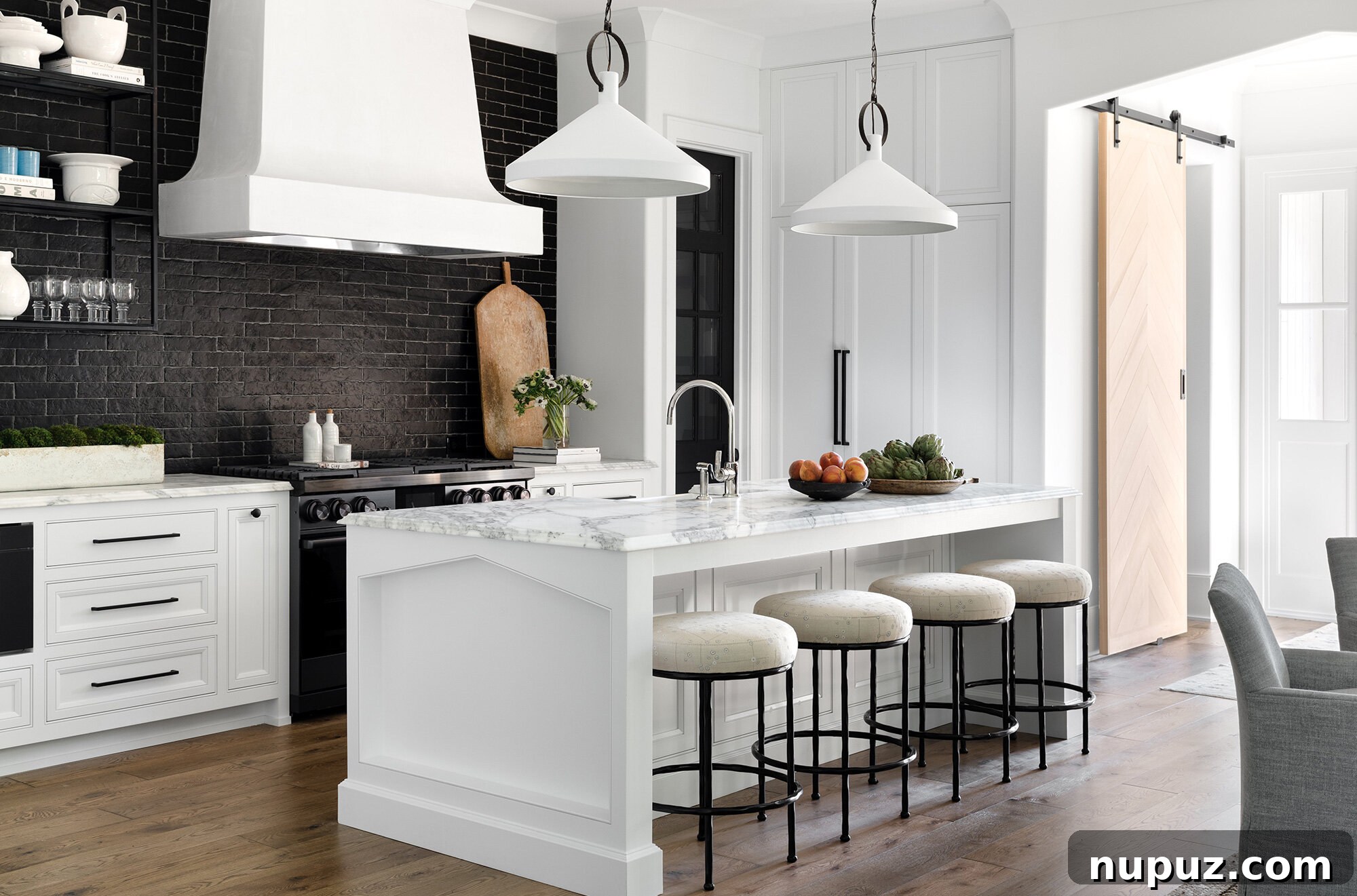 10 Breathtaking Kitchen Makeovers to Inspire You 6 Stunning kitchen featuring a unique textured backsplash or wall treatment that adds artistic depth and a focal point to the design, complemented by sleek countertops.