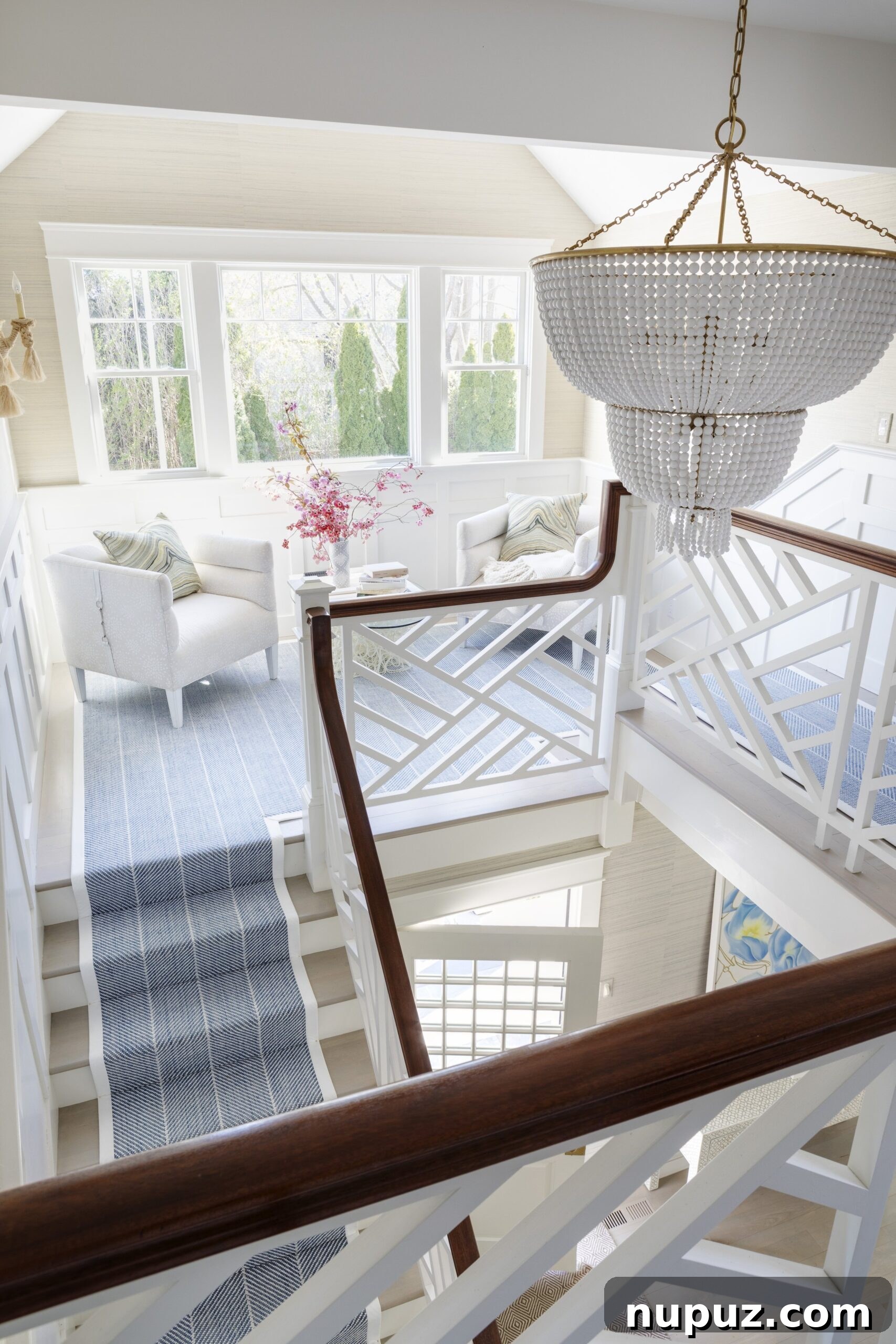 Spacious coastal living room with plush sofas, natural textures, and ocean views at Matunuck Beach