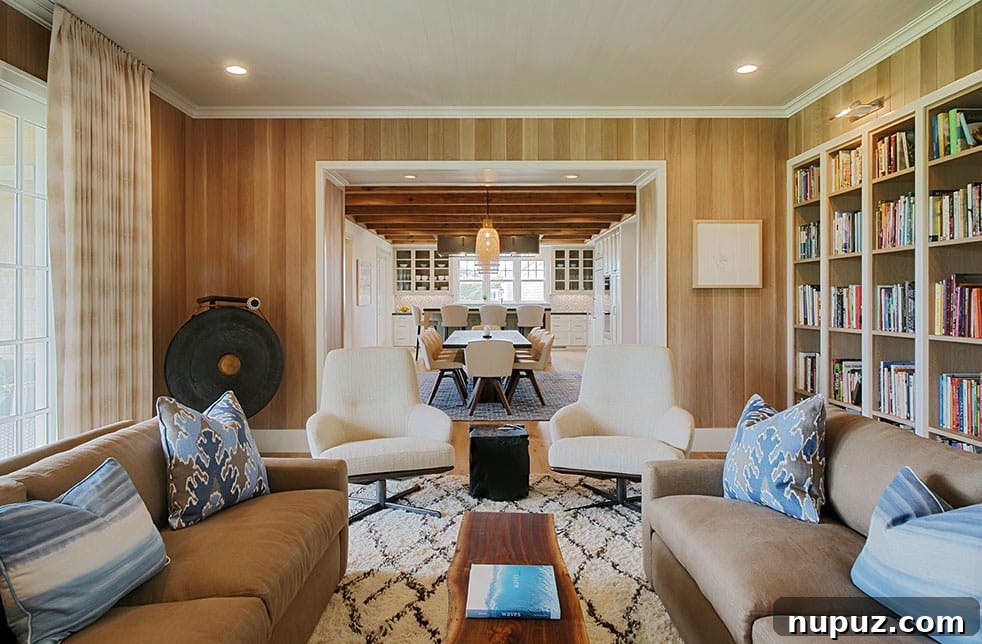 Cozy living room with warm stained walls, designed by Nina Liddle Design to exude comfort and timeless appeal, photographed by Jane Beiles Photography.
