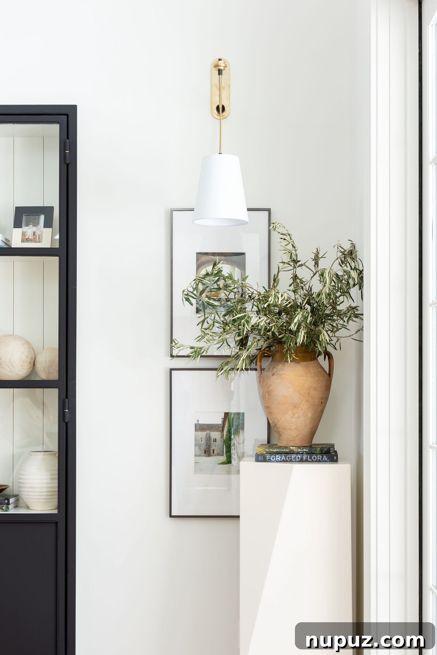 A beautifully styled living space featuring elegant furnishings and art, showcasing personalized interior design.