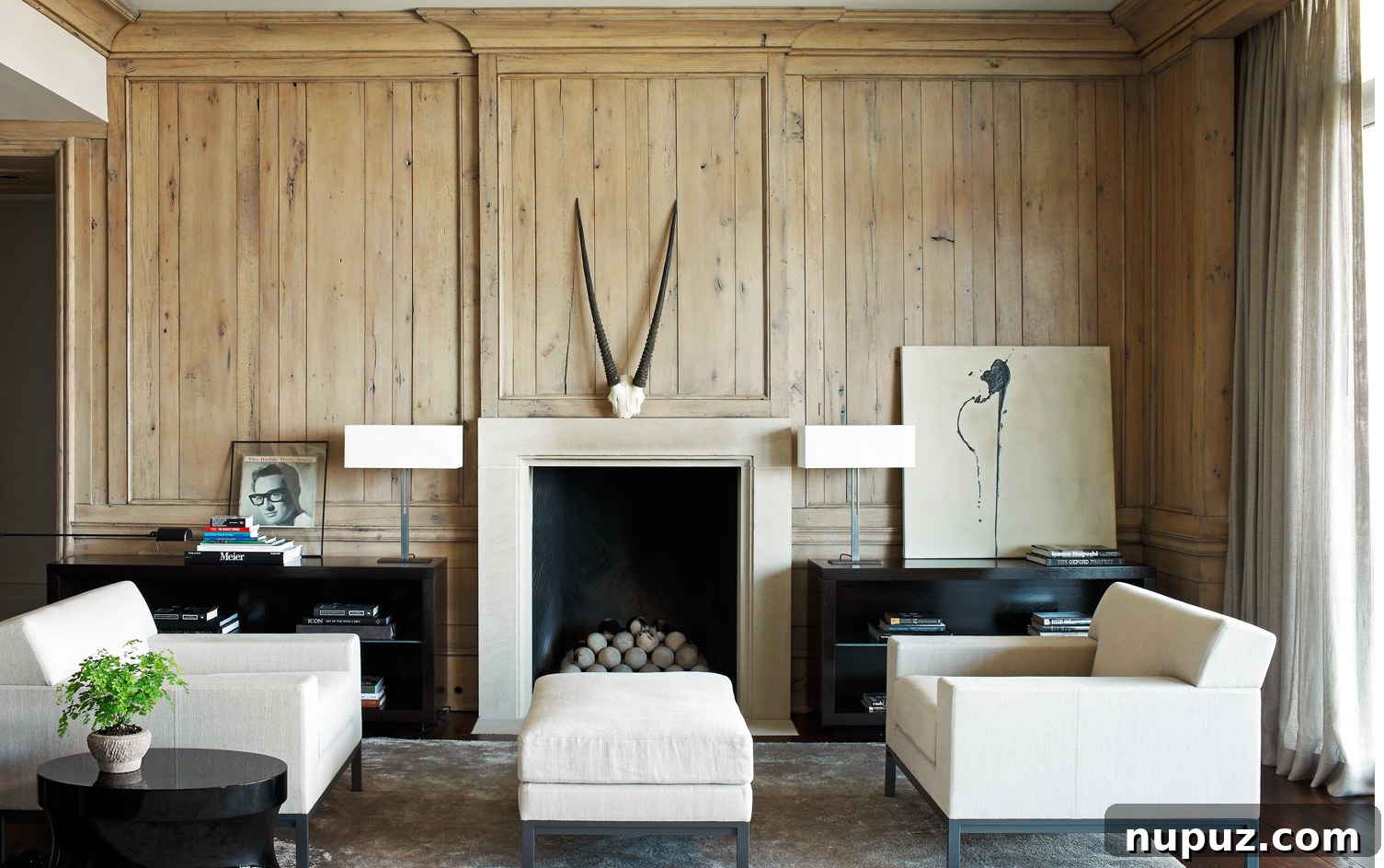 Elegant living room with neutral decor, showcasing the foundational beauty of Paul Bates Architecture and refined interiors by Betsy Brown Interiors.