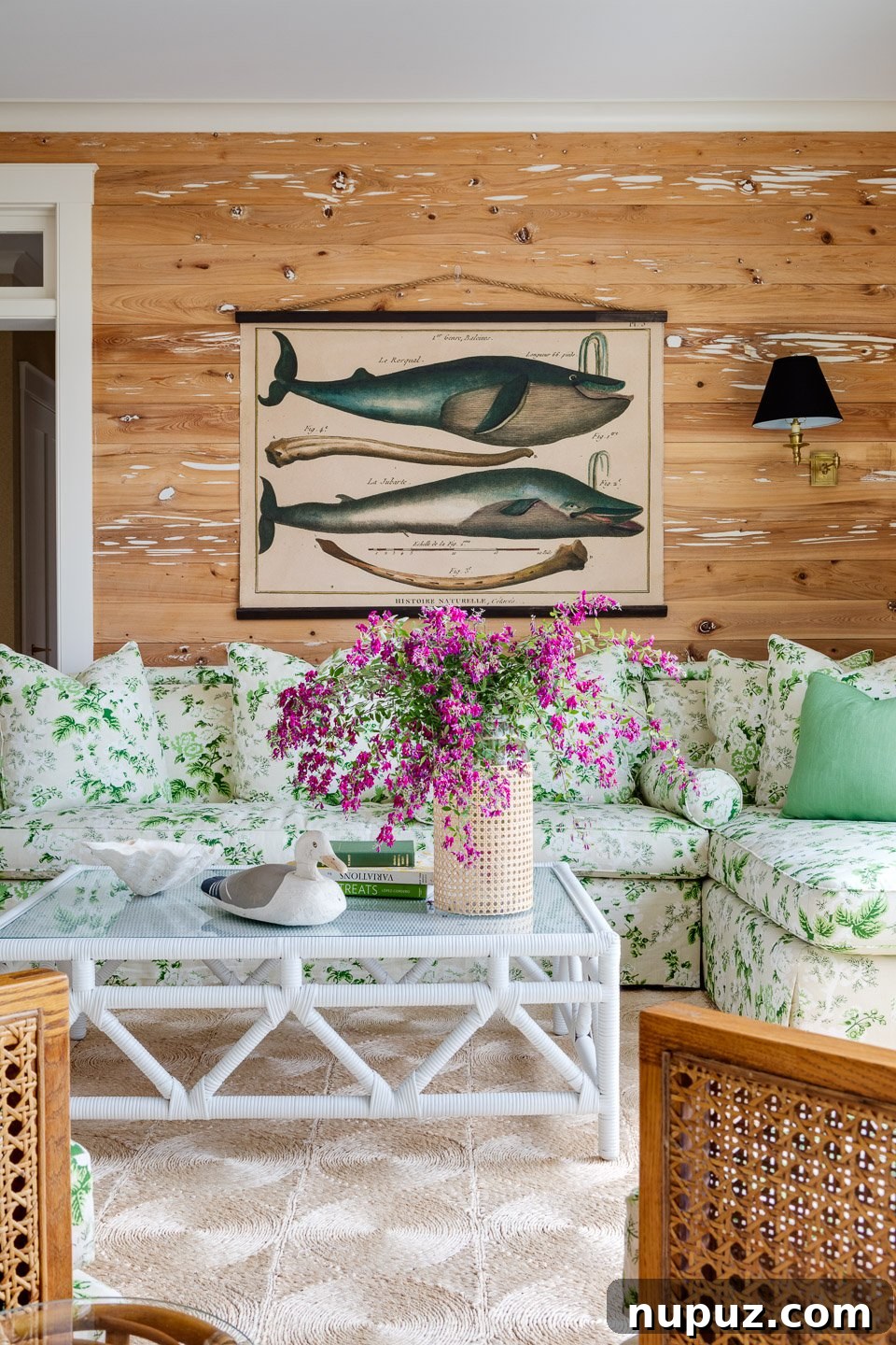 Bright living room with blonde wood floors and natural light, designed by Digs Design Co.