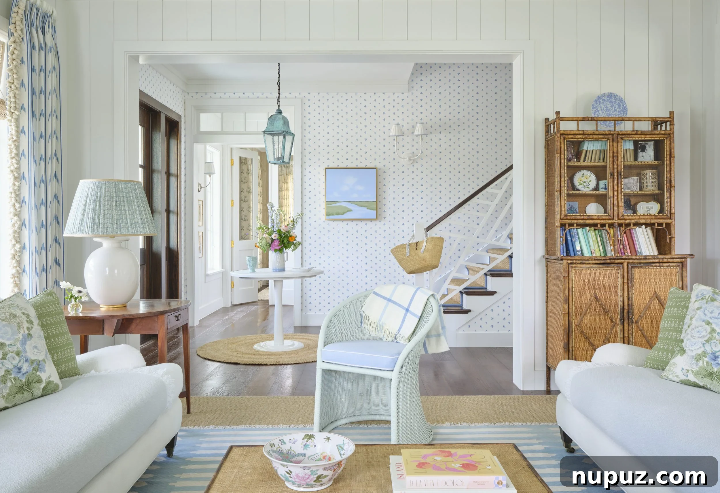 Kara Miller's Farmhouse Retreat 2 Stunning exterior view of a charming farmhouse designed by Kara Miller, featuring classic architecture and an inviting presence. Photography by Brantley Photography.