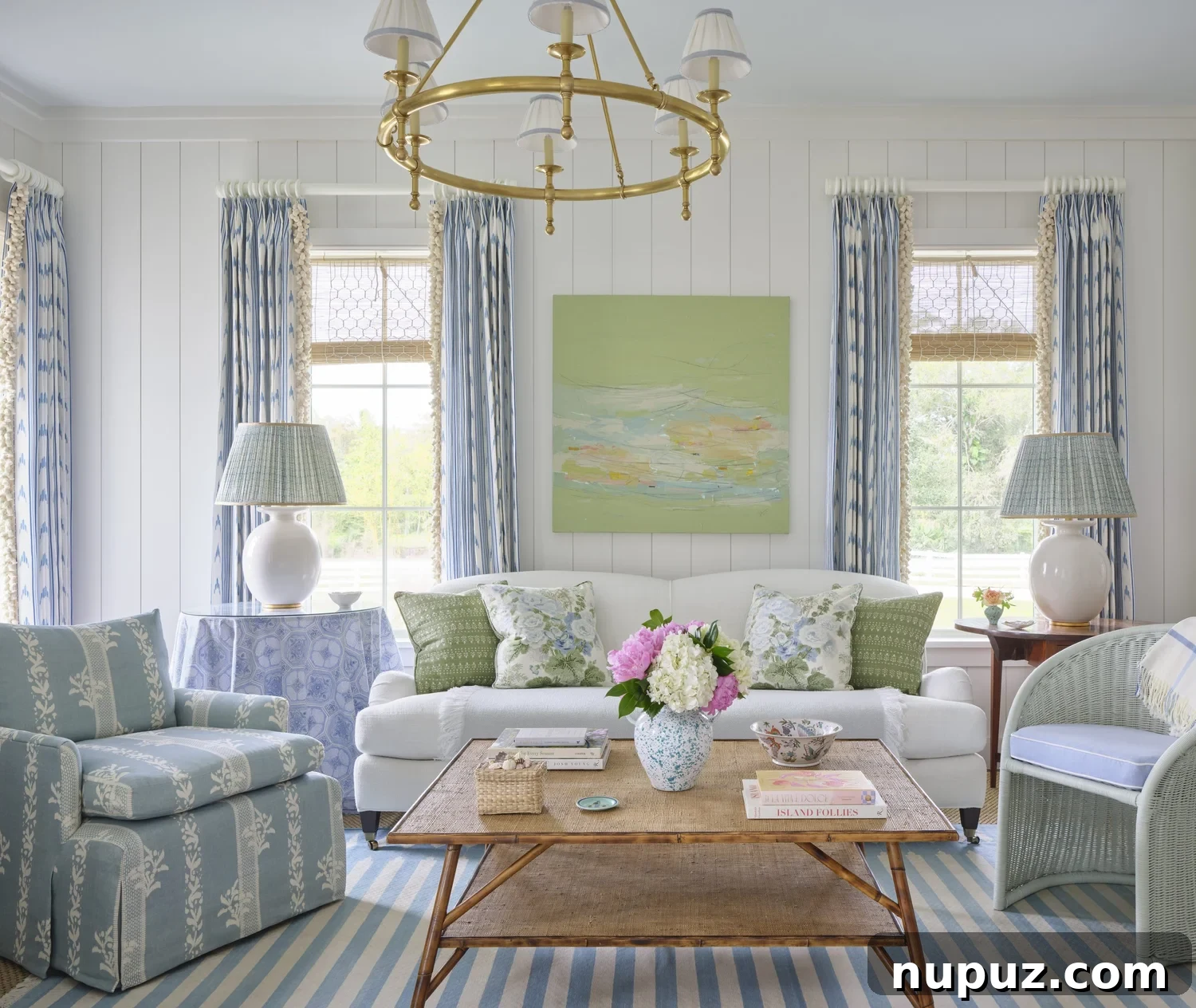 Kara Miller's Farmhouse Retreat 4 Cozy seating area with stylish upholstered furniture and thoughtful decor elements, showcasing Kara Miller's attention to comfort and aesthetic in the farmhouse. Photography by Brantley Photography.