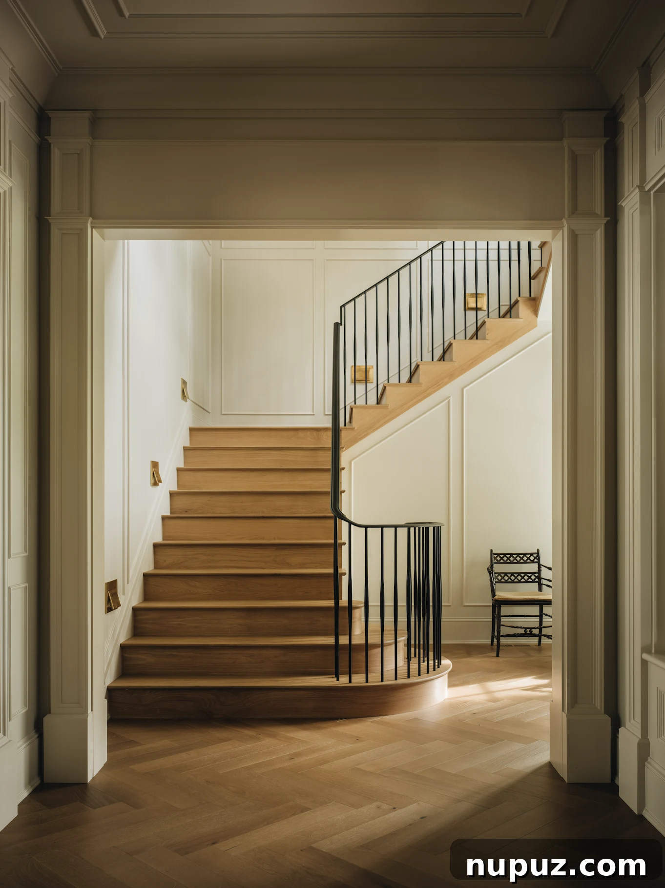 Infuse Your Space with Soul: Creative Home Decor Inspirations 2 Exterior view of a beautifully designed home, showcasing classic architecture and welcoming curb appeal, a masterpiece by Jean Stoffer Design.