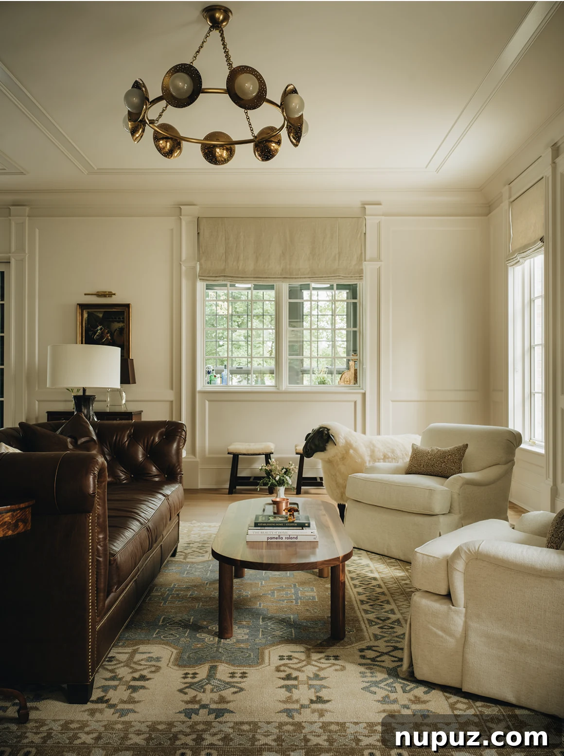 Infuse Your Space with Soul: Creative Home Decor Inspirations 3 Elegant living room featuring a warm, neutral color scheme, plush seating, and a stately fireplace, exuding calm and sophistication.