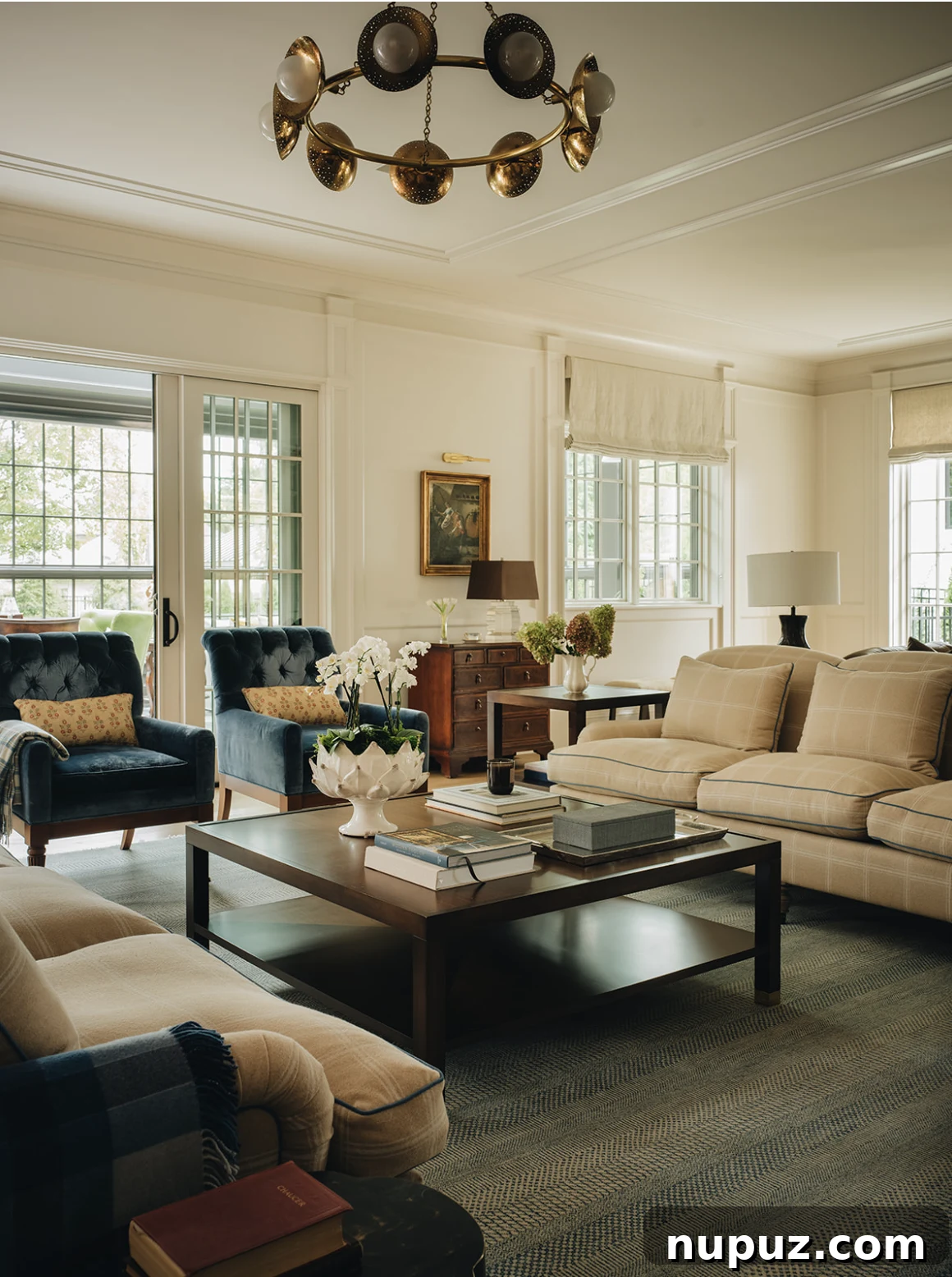 Infuse Your Space with Soul: Creative Home Decor Inspirations 4 Cozy living room with comfortable neutral sofas, a stylish coffee table, and an abundance of natural light, perfect for family gatherings.