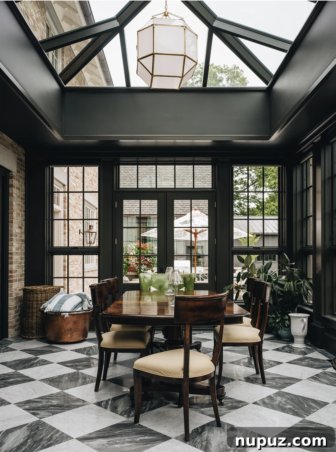 Infuse Your Space with Soul: Creative Home Decor Inspirations 7 Stunning sunroom with striking black and white checkerboard marble flooring, expansive glass ceiling, and abundant natural light, offering an outdoor feel indoors.