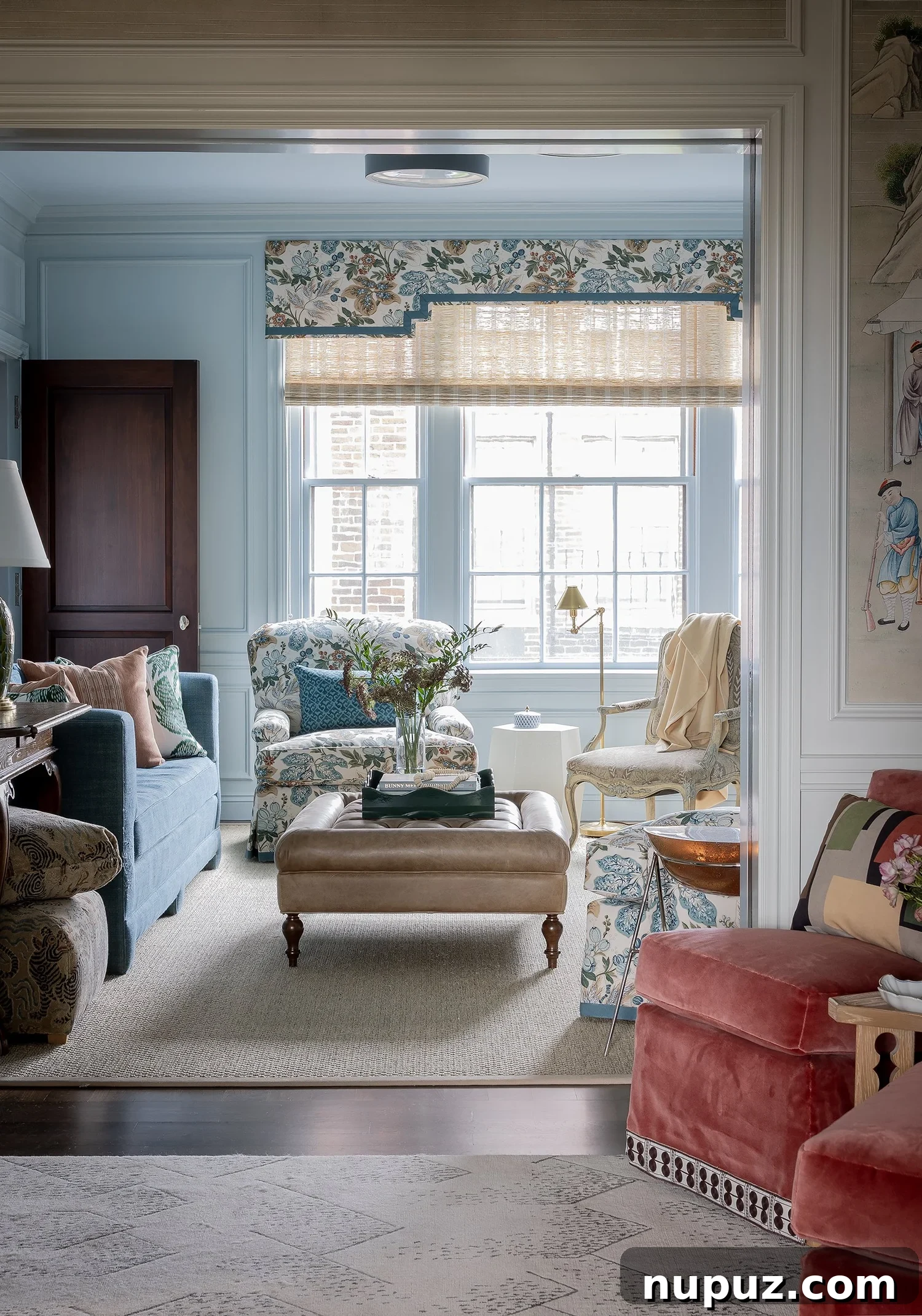 Luxurious living room with layered textures and a sophisticated color scheme by Honey Collins Interiors.