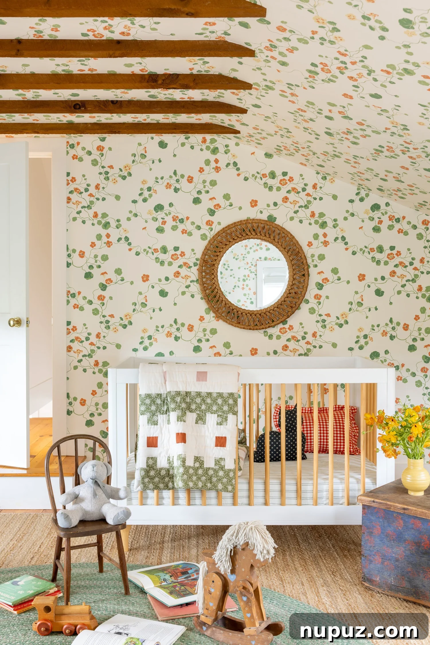 Discover 6 cozy home decor tips to make your home inviting. From simple decor updates to warm lighting ideas, create a space you’ll love! Ariel Okin Interior Design | Julie Leffell Photography - adore the nursery with wood beams and charming wallpaper