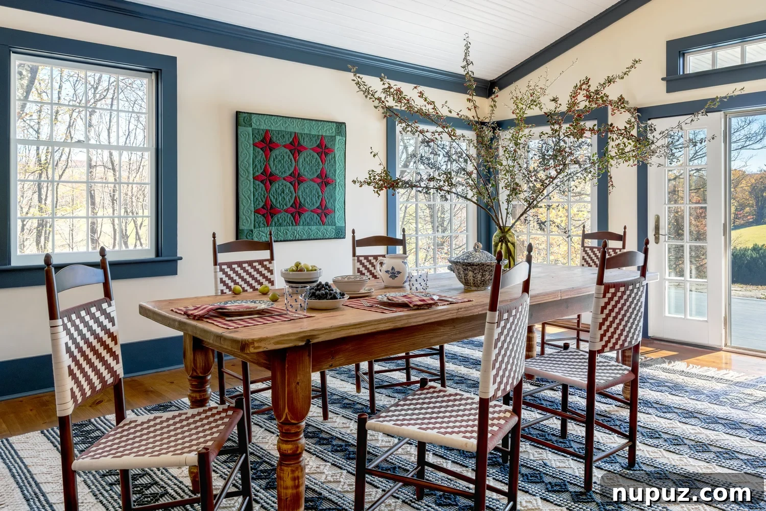 Discover 6 cozy home decor tips to make your home inviting. From simple decor updates to warm lighting ideas, create a space you’ll love! Ariel Okin Interior Design | Julie Leffell Photography - Beautiful dining rooms with hanging quilt