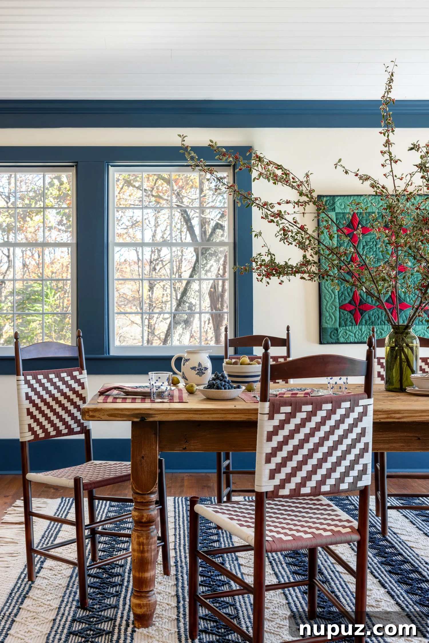 Discover 6 cozy home decor tips to make your home inviting. From simple decor updates to warm lighting ideas, create a space you’ll love! Ariel Okin Interior Design | Julie Leffell Photography - beautiful dining room with hanging quilt