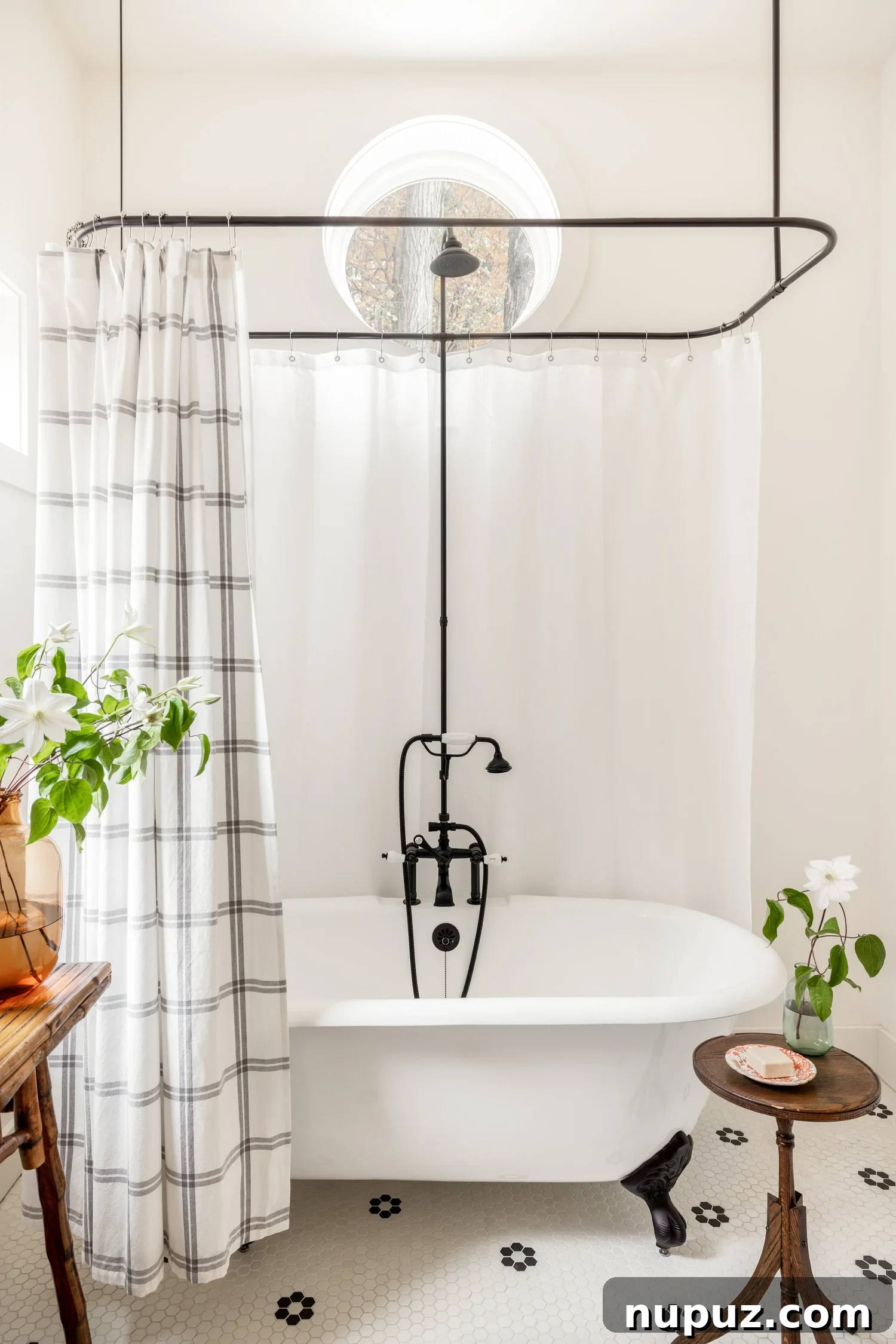 Discover ways make your home warm and inviting. From simple decor updates to warm lighting ideas, create a space you’ll love! Ariel Okin Interior Design | Julie Leffell Photography - adore the claw foot tub in this blue and white bedroom