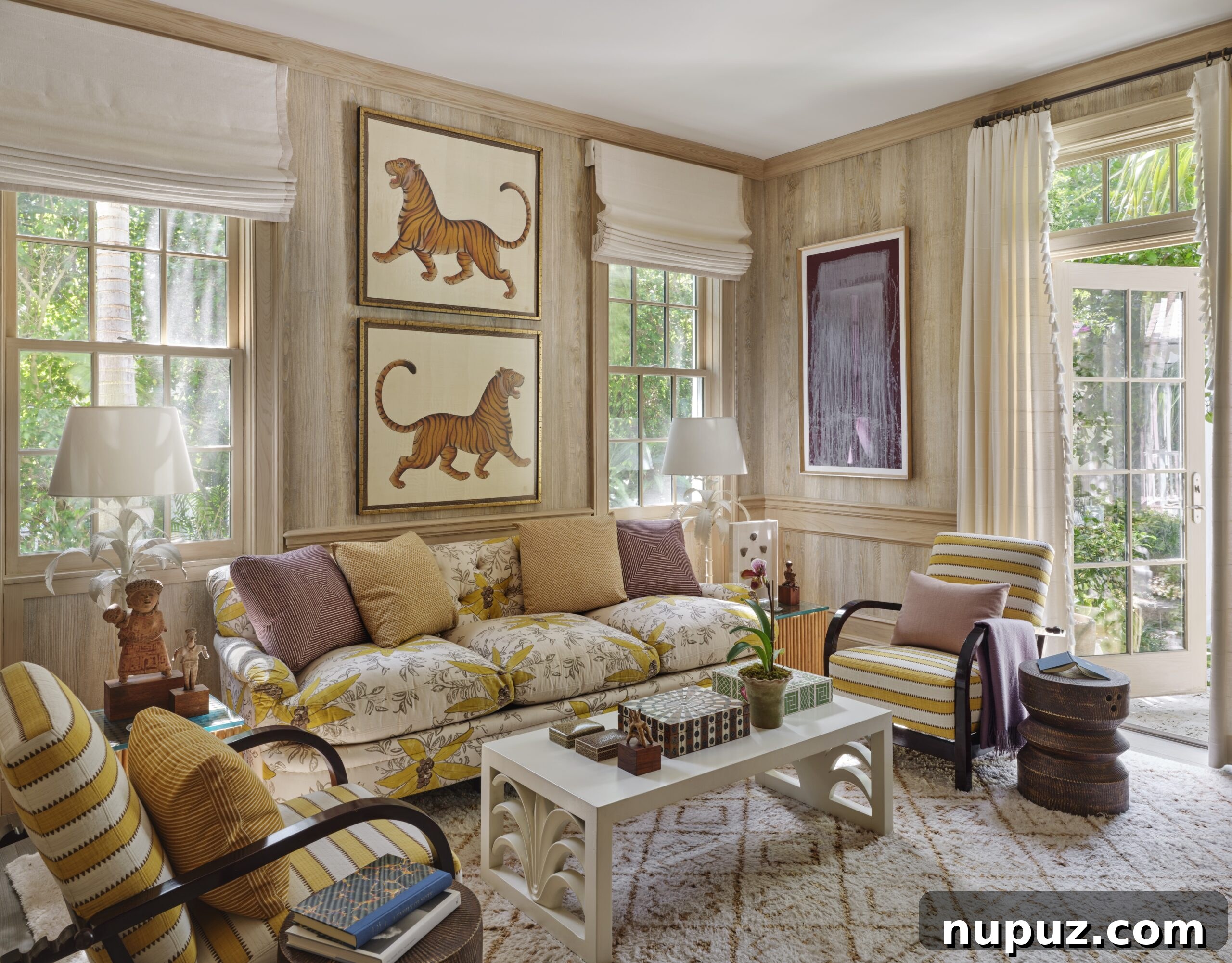 Effortless Elegance: Tom Scheerer's Interior Design Insights 2 Tom Scheerer's new coffee table book STILL DECORATING features a breathtaking neutral living room with blonde wood paneling, showcasing his peerless interior design style.