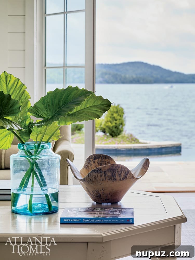 Beyond Beauty: Crafting Homes with Soul and Personality 4 Living room with panoramic lake views at the Liz Williams designed Lake Martin house