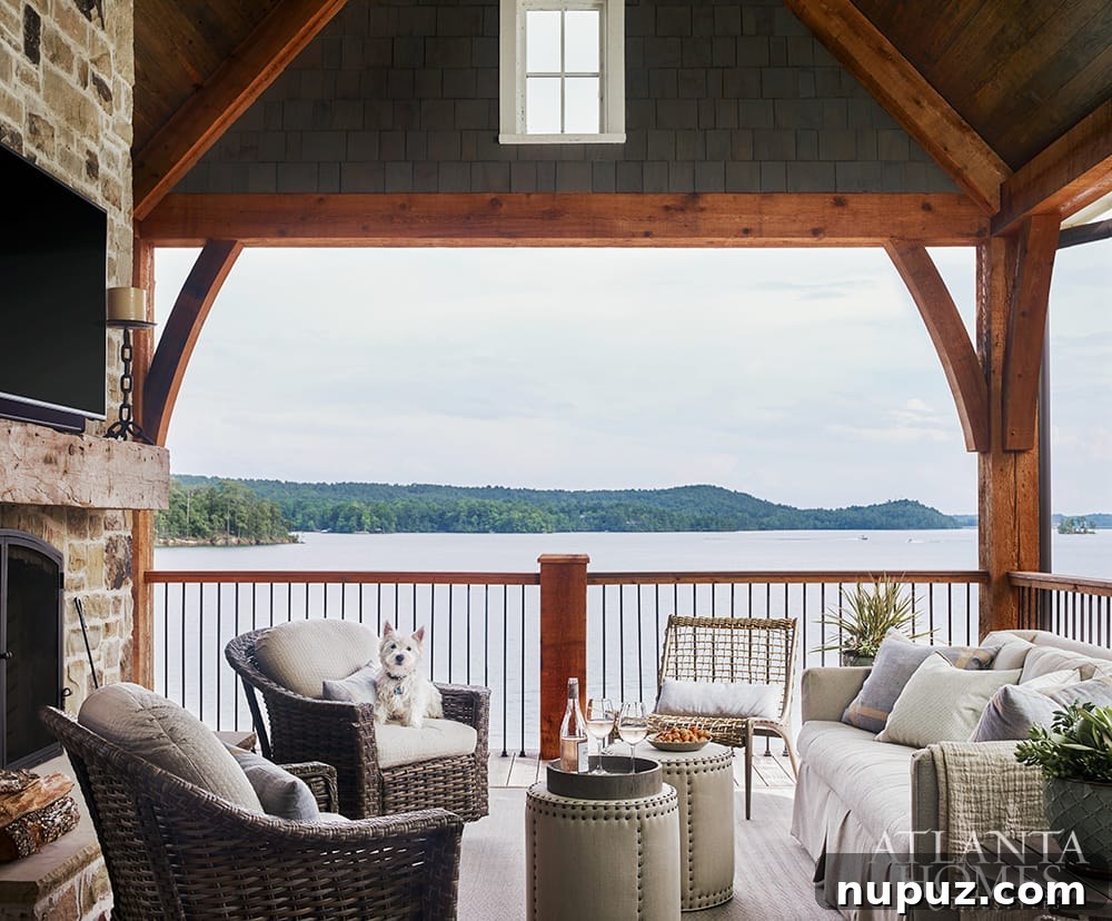 Beyond Beauty: Crafting Homes with Soul and Personality 9 Exterior view of the Lake Martin lake house showing outdoor living space and landscaping