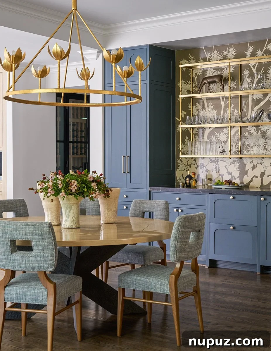 10 Exquisite Dining Rooms by Mary Beth Wagner 5 A transitional dining room by Mary Beth Wagner, blending modern and traditional elements with a mix of seating and a statement ceiling fixture. Photographed by Nathan Schroder.