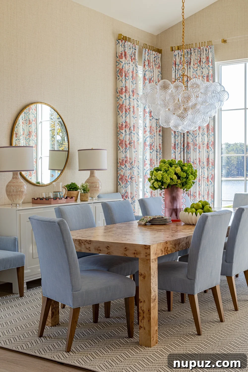 10 Exquisite Dining Rooms by Mary Beth Wagner 7 A grand dining room with an expansive table, ornate chandelier, and sophisticated wall treatments, showcasing Mary Beth Wagner's approach to classic design. Photographed by Nathan Schroder.