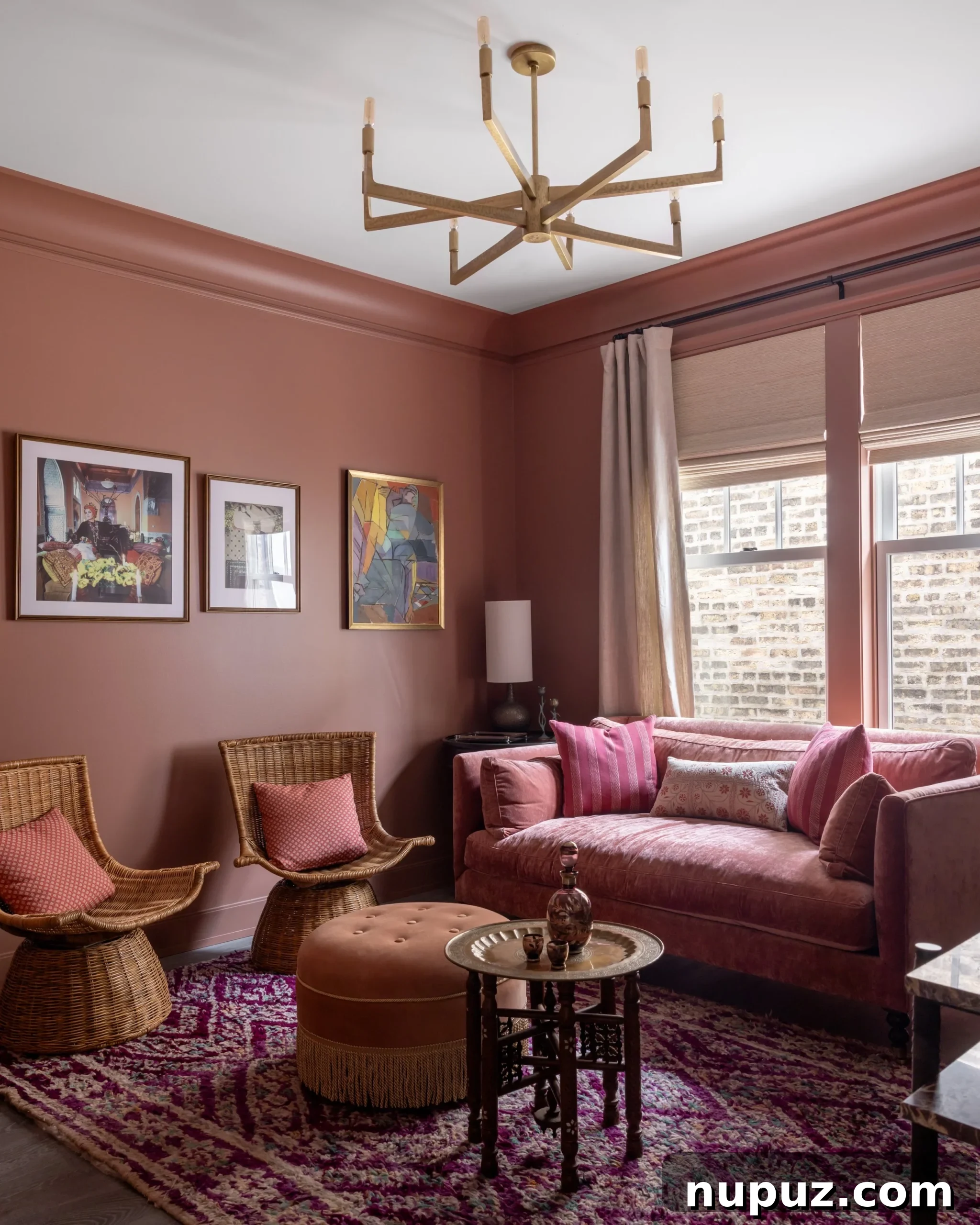 Spacious and serene Imparfait Design Studio living room with tall windows, a large rug, and an elegant console.