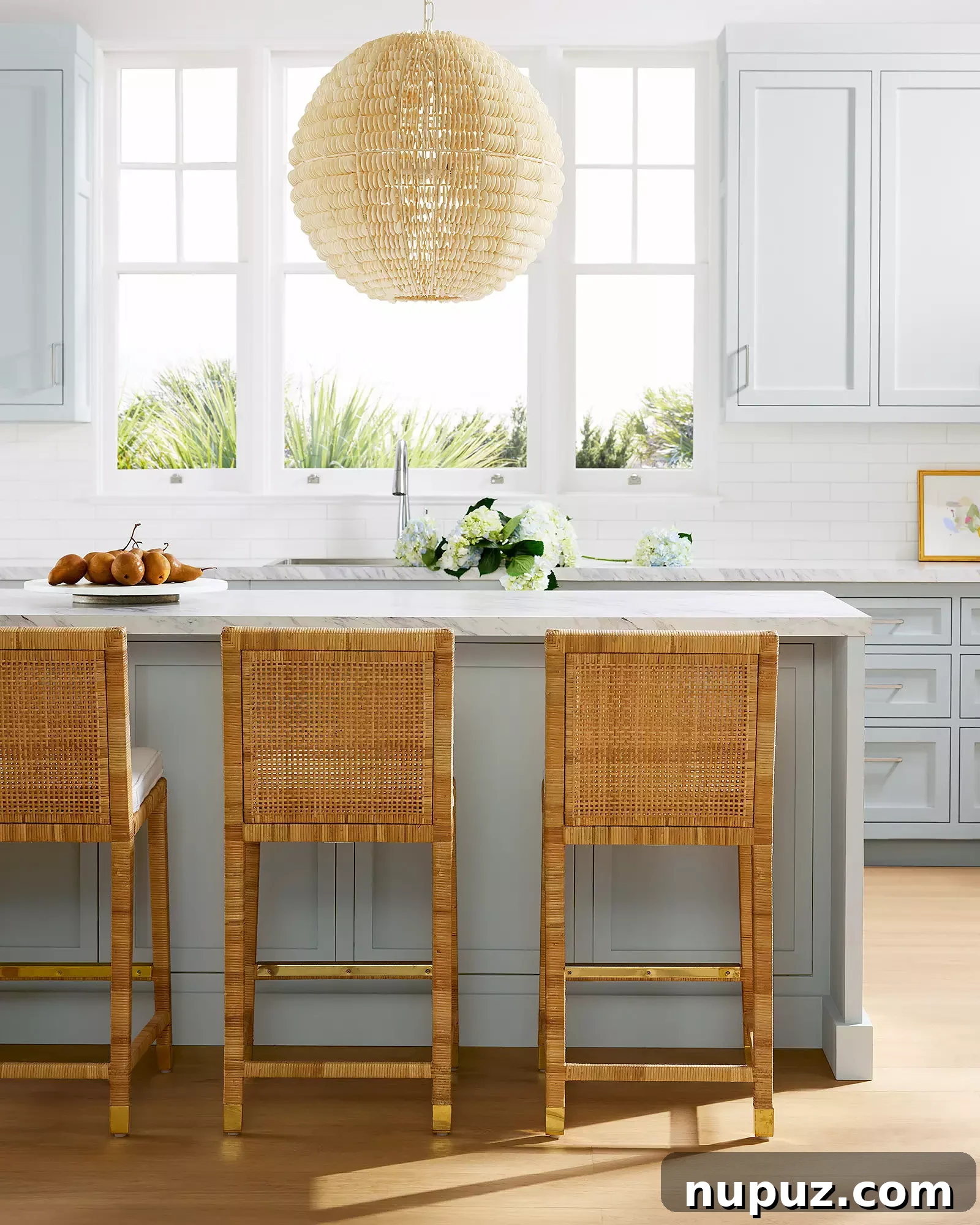 Transform Your Home With 10 Chic Lighting Fixtures 5 Contemporary kitchen island with matte black lanterns