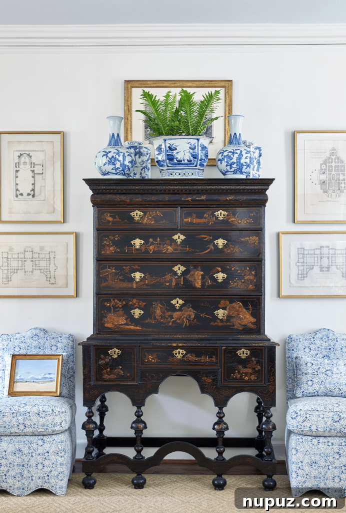 Adding an antique piece of furniture, like a vintage console or a classic armchair, instantly grounds a room and injects a sense of history and unique charm. Design by Sarah Bartholomew, Photography by David Hillegas.