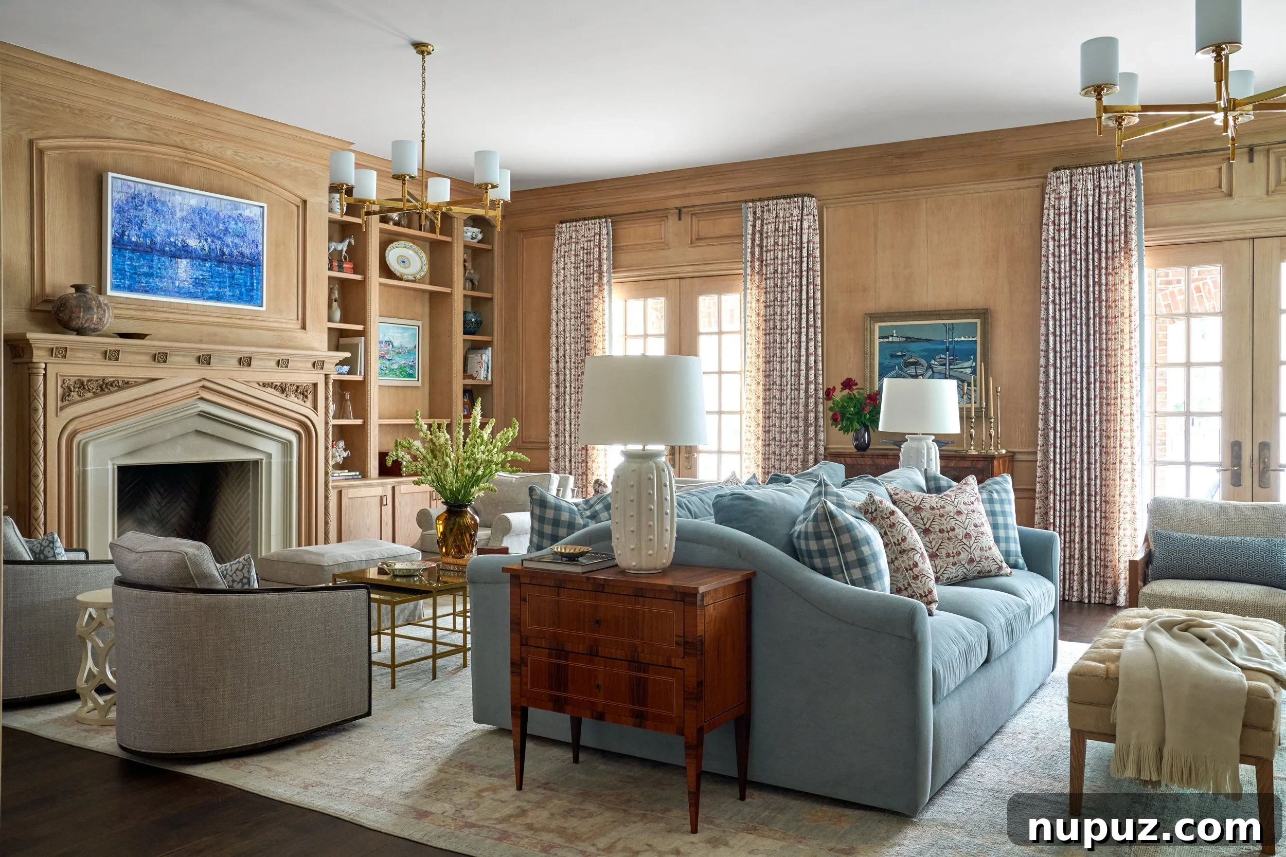 Layering different types of lighting, from overhead fixtures to lamps and sconces, creates warmth and depth in any room. Mary Beth Wagner Design, Photography by Nathan Schroder.