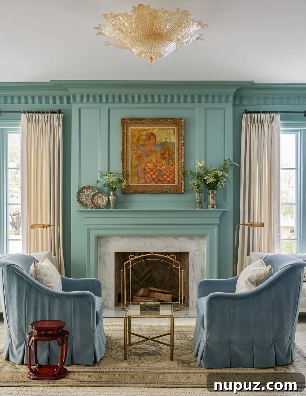 Symmetry in interior design, such as a pair of lamps flanking a sofa or matching nightstands, creates instant balance and a sense of calm harmony. Design by Jenkins Interiors, Photography by Nathan Schroder.