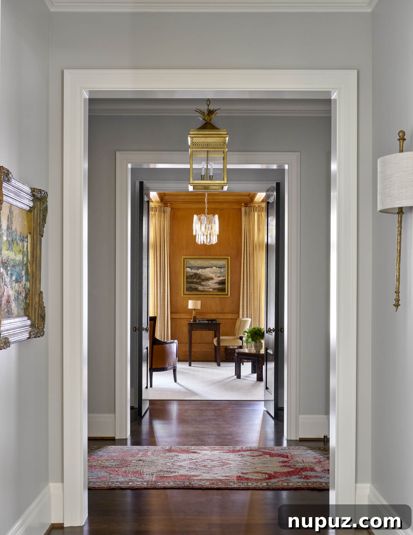 The right rug defines a space, softens footsteps, and provides a beautiful foundation for layering textures in a room. Illustrated by Collins Interiors, Photography by Nathan Schroder.