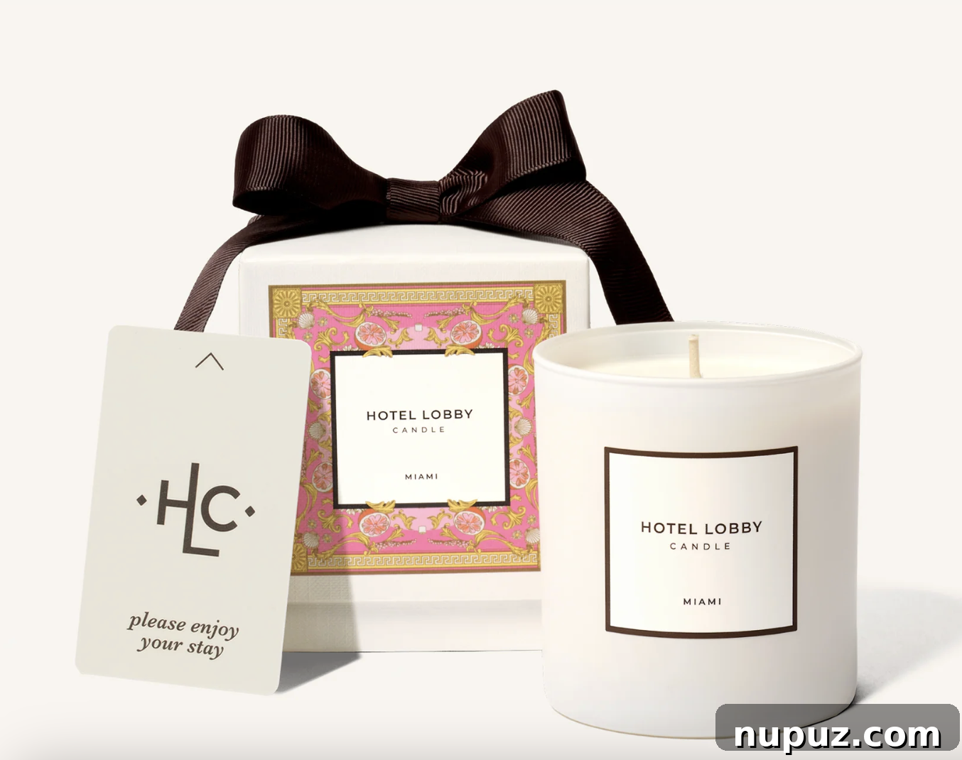 Beyond Beige: Designing a Home That's Uniquely You 7 Hotel Lobby's Holiday Hotel Candle offers a sensory experience, linking scent and color to create a festive ambiance in any home.