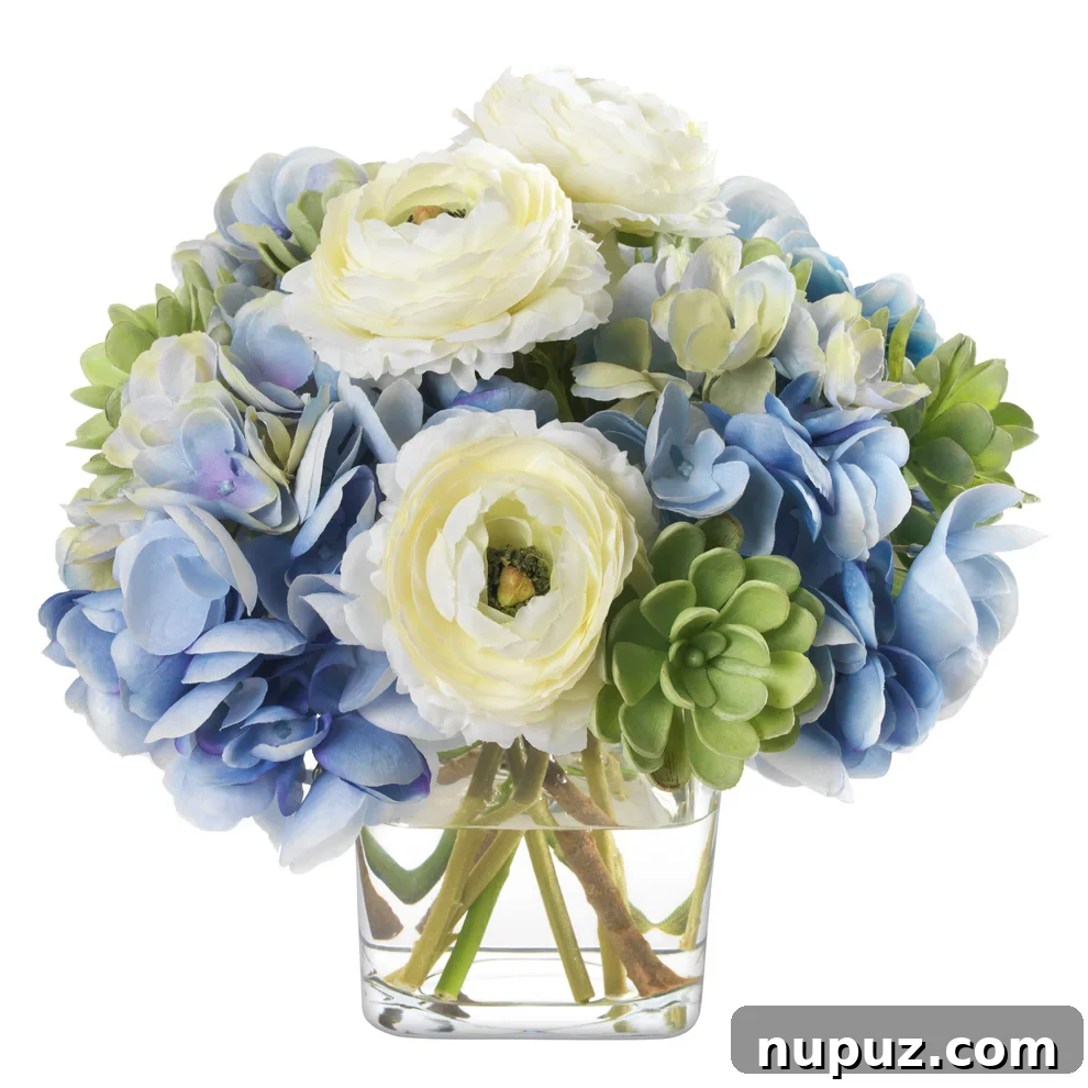 Vibrant blue and white floral arrangement with decorative pottery
