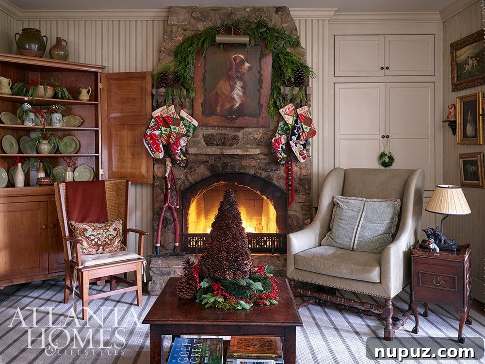 Bright and airy living room decorated for the holidays, featuring a sophisticated Christmas tree and tasteful accents. Interior design by Liza Bryan Interiors.