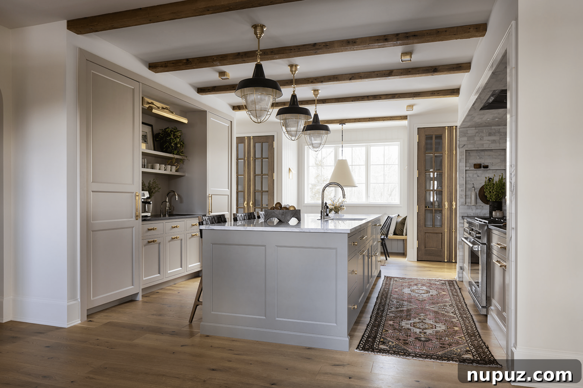 Designing Your Ultimate Home Coffee Bar 7 Chic kitchen coffee bar illuminated by stylish library lights, casting a warm and inviting glow over the counter and coffee setup.