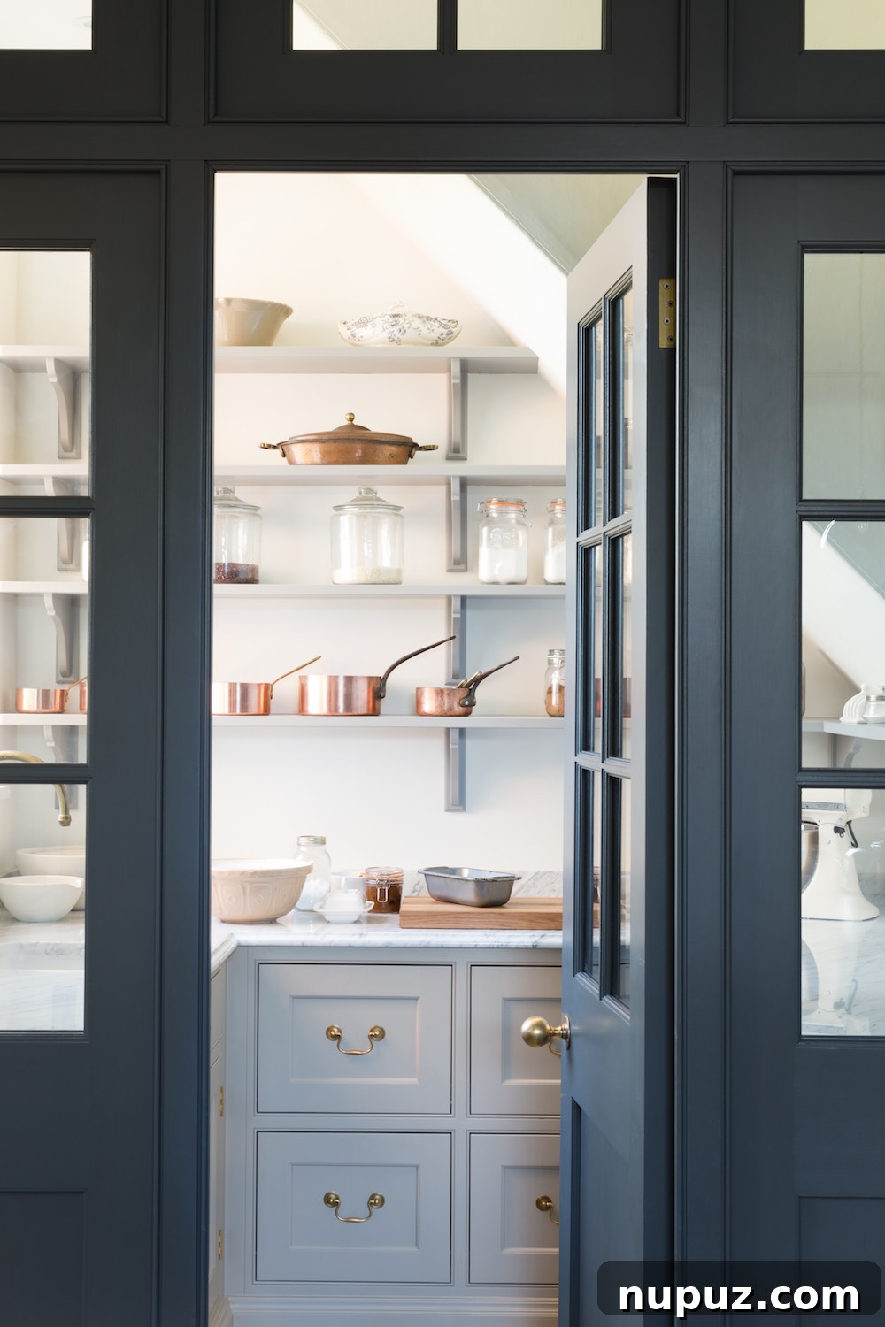 Humphrey Munson kitchen featuring decorative copper cookware beautifully displayed, Paul Craig Photography.
