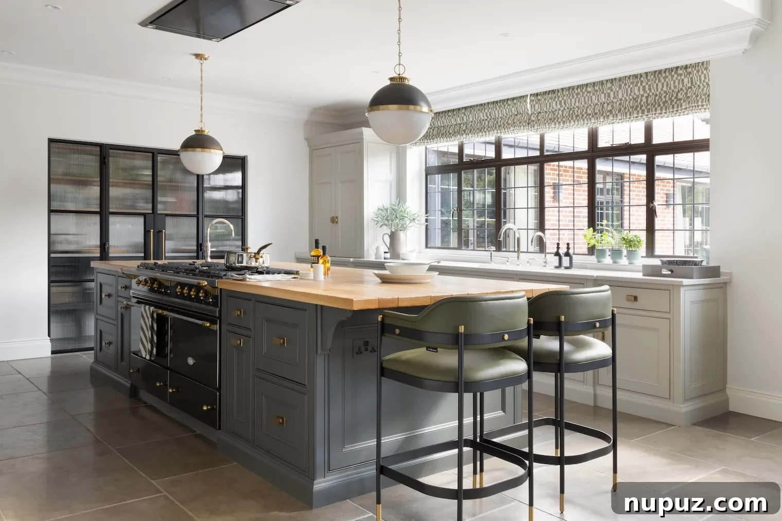 A wide view of a modern and inviting Humphrey Munson kitchen, designed for both beauty and utility, photographed by Paul Craig.