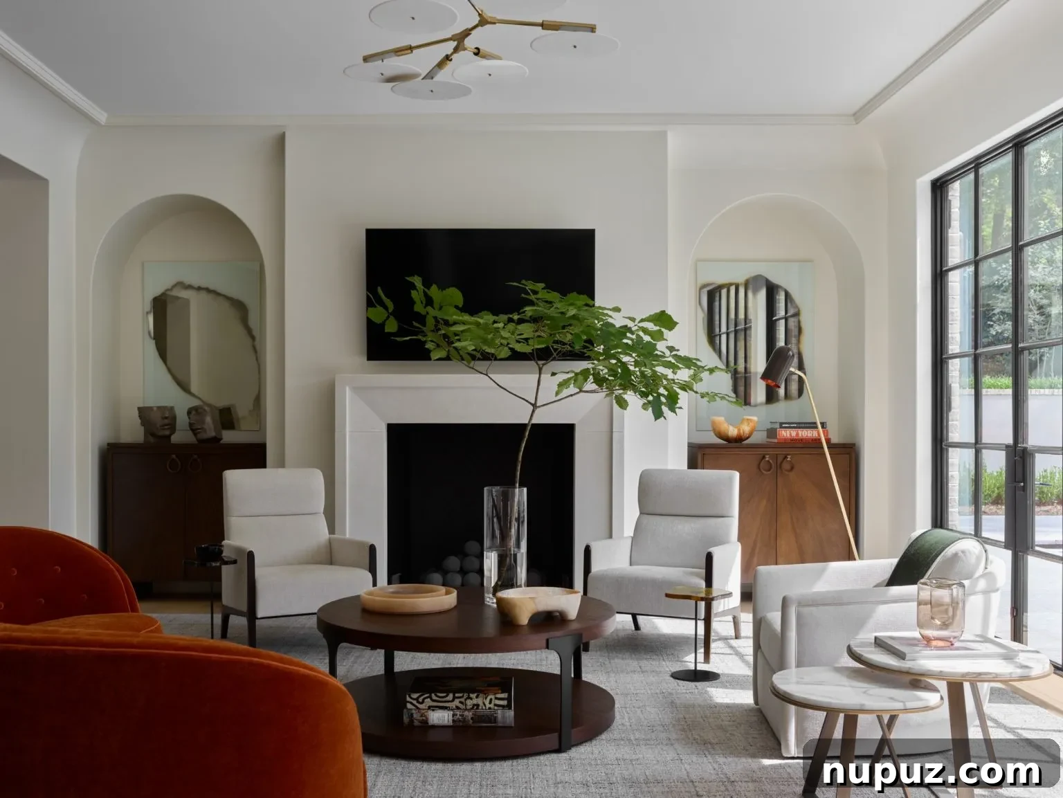 Bright and spacious living room with traditional decor and elegant touches by Design Atelier, photographed by Emily Followill.