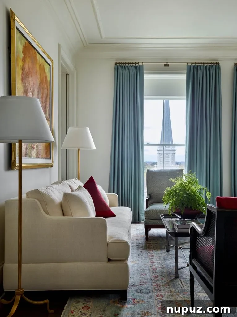 Beautifully styled living room with intricate details, a refined ambiance, and comfortable furnishings by Design Atelier, photographed by Emily Followill.
