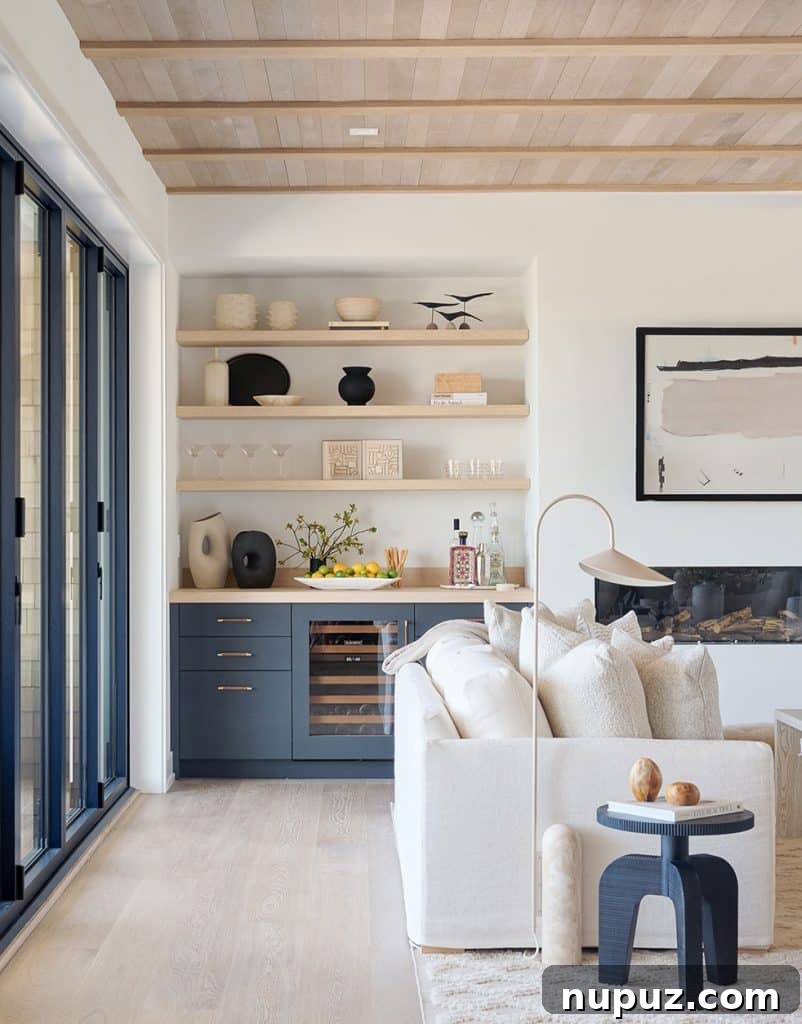 Contemporary Family Havens Designing for Modern Life 3 Nina Liddle Design: Spacious open-concept living room with custom fireplace and abstract artwork